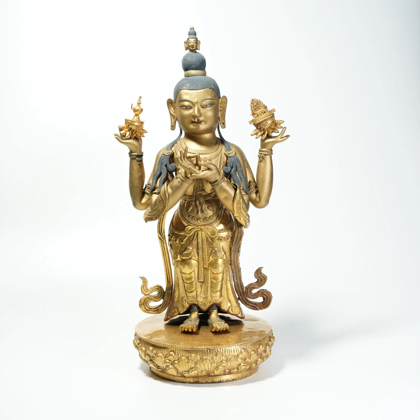 A GILDED BRONZE BUDDHA STATUE