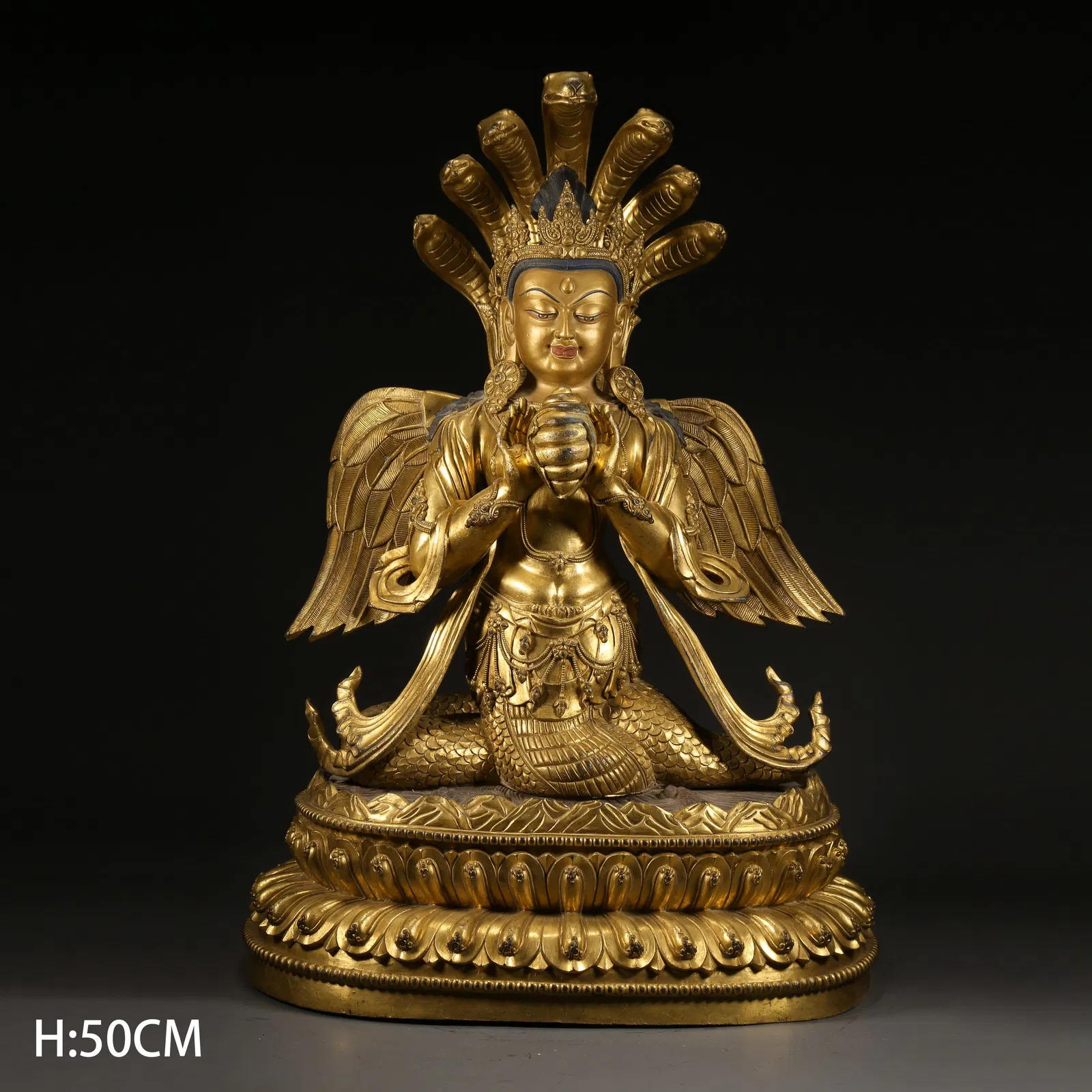 A GILDED BRONZE DRAGON WOMAN STATUE