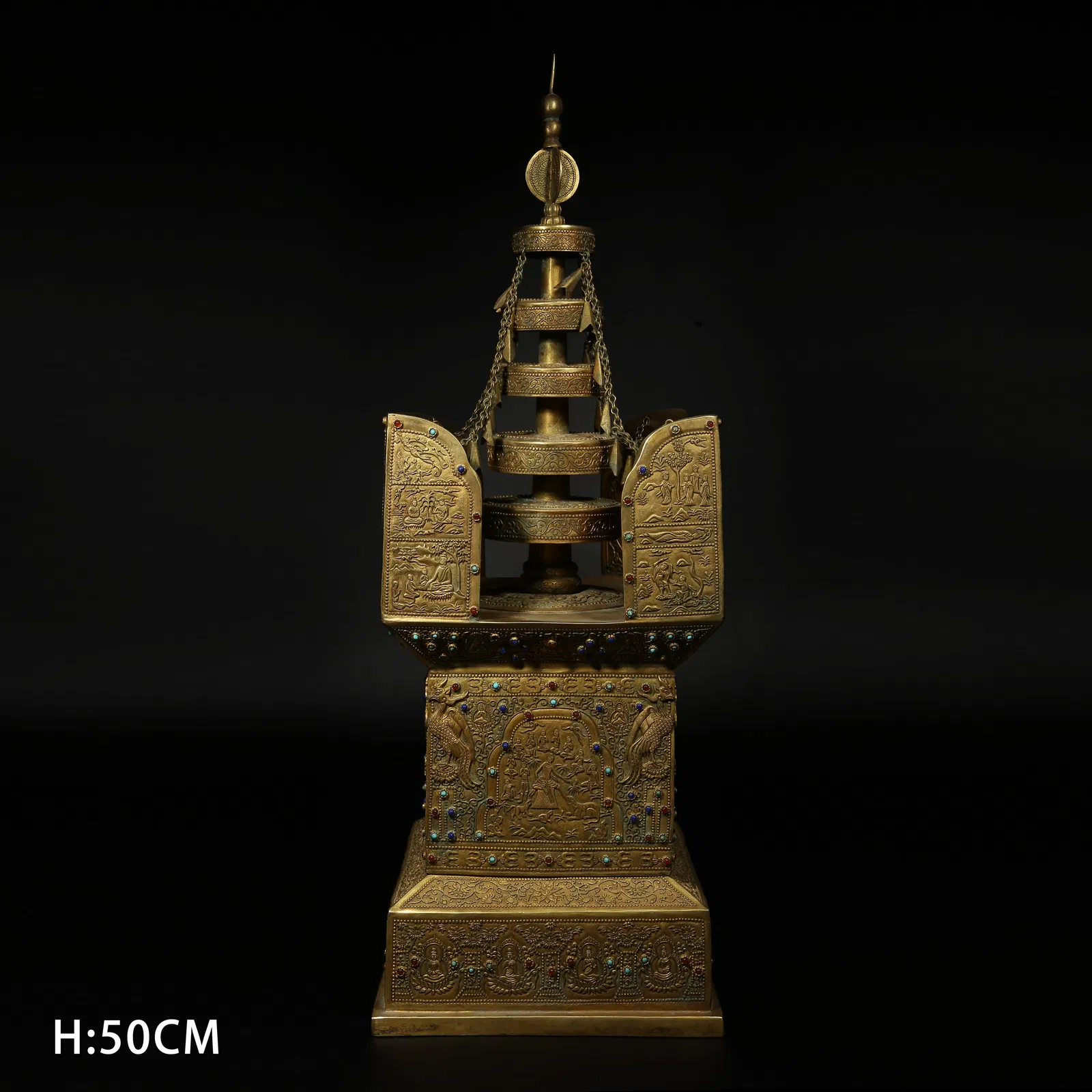 A GILDED BRONZE GEM-INLAID BUDDHIST STUPA