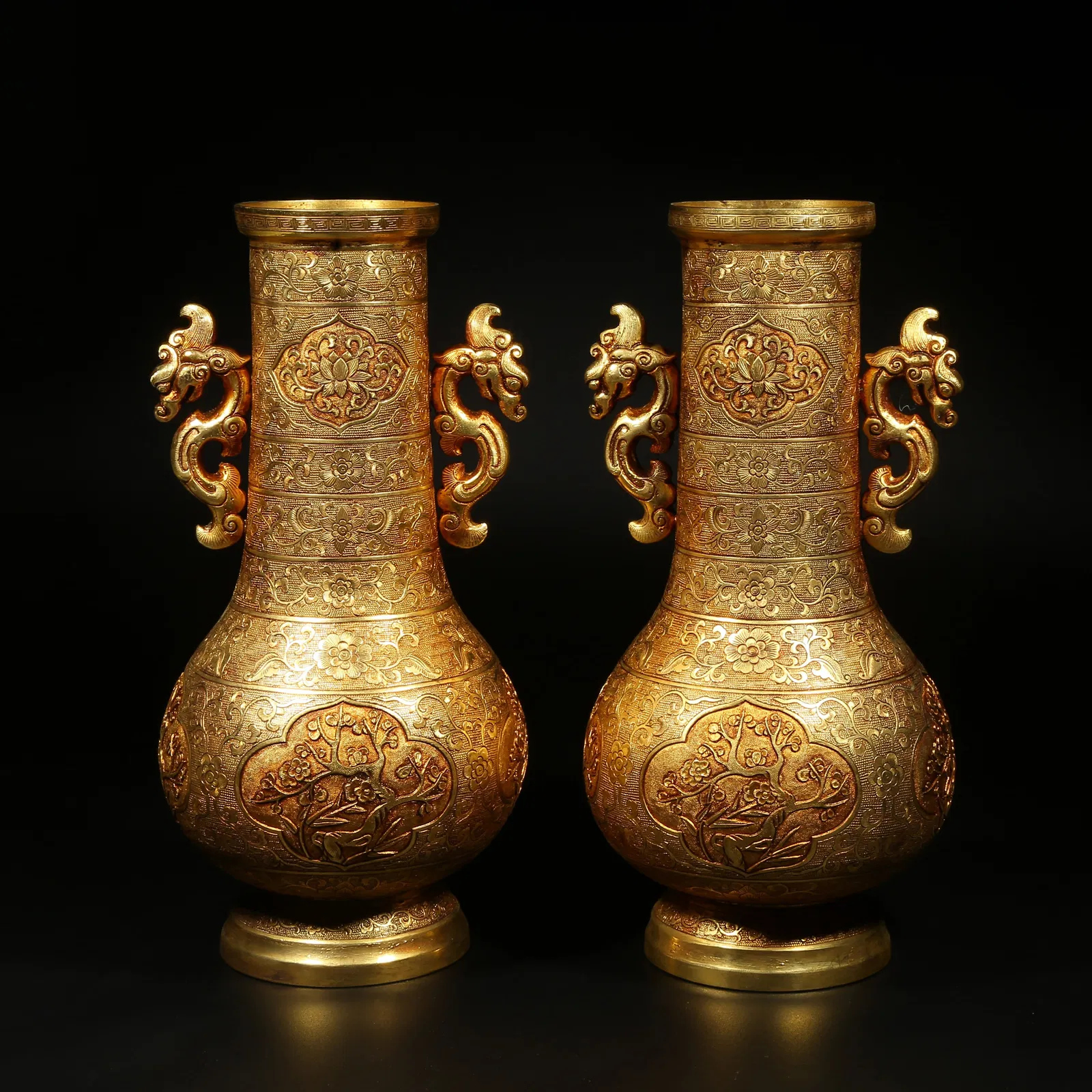 A GILDED BRONZE PLUM BLOSSOM PATTERN VASES WITH DRAGON HANDLES, PAIR