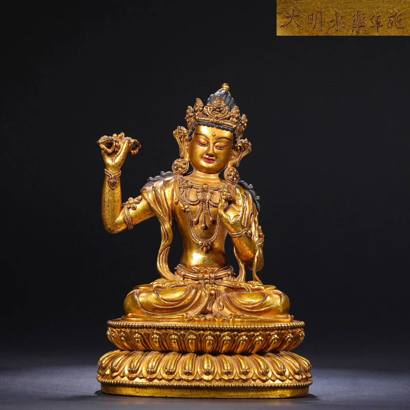 A GILDED BRONZE STATUE OF VAJRASATTVA FROM YONGLE OF THE MING DYNASTY