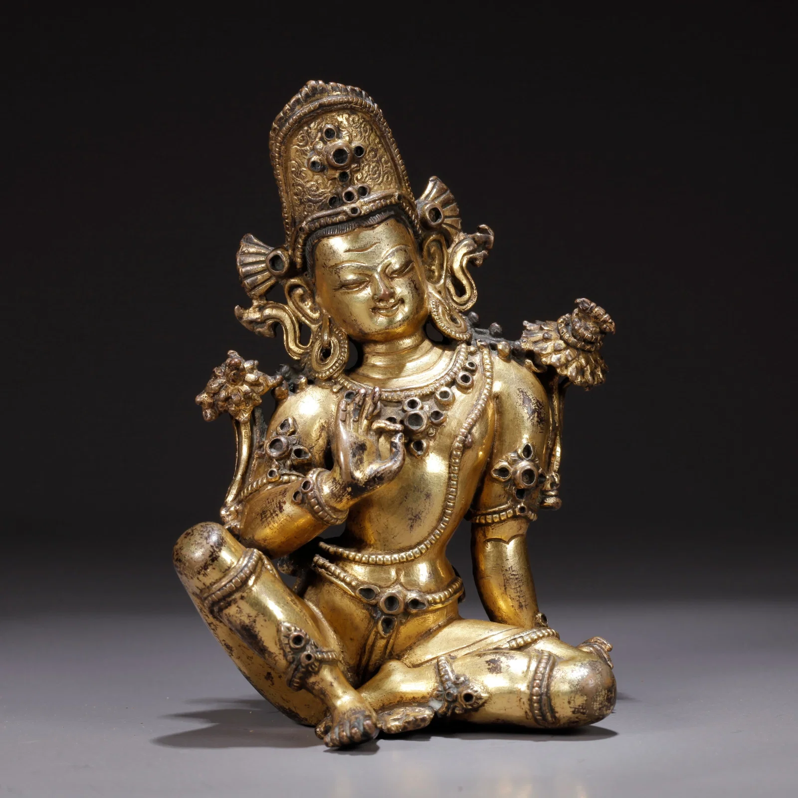 A GILDED BRONZE VAJRA STATUE