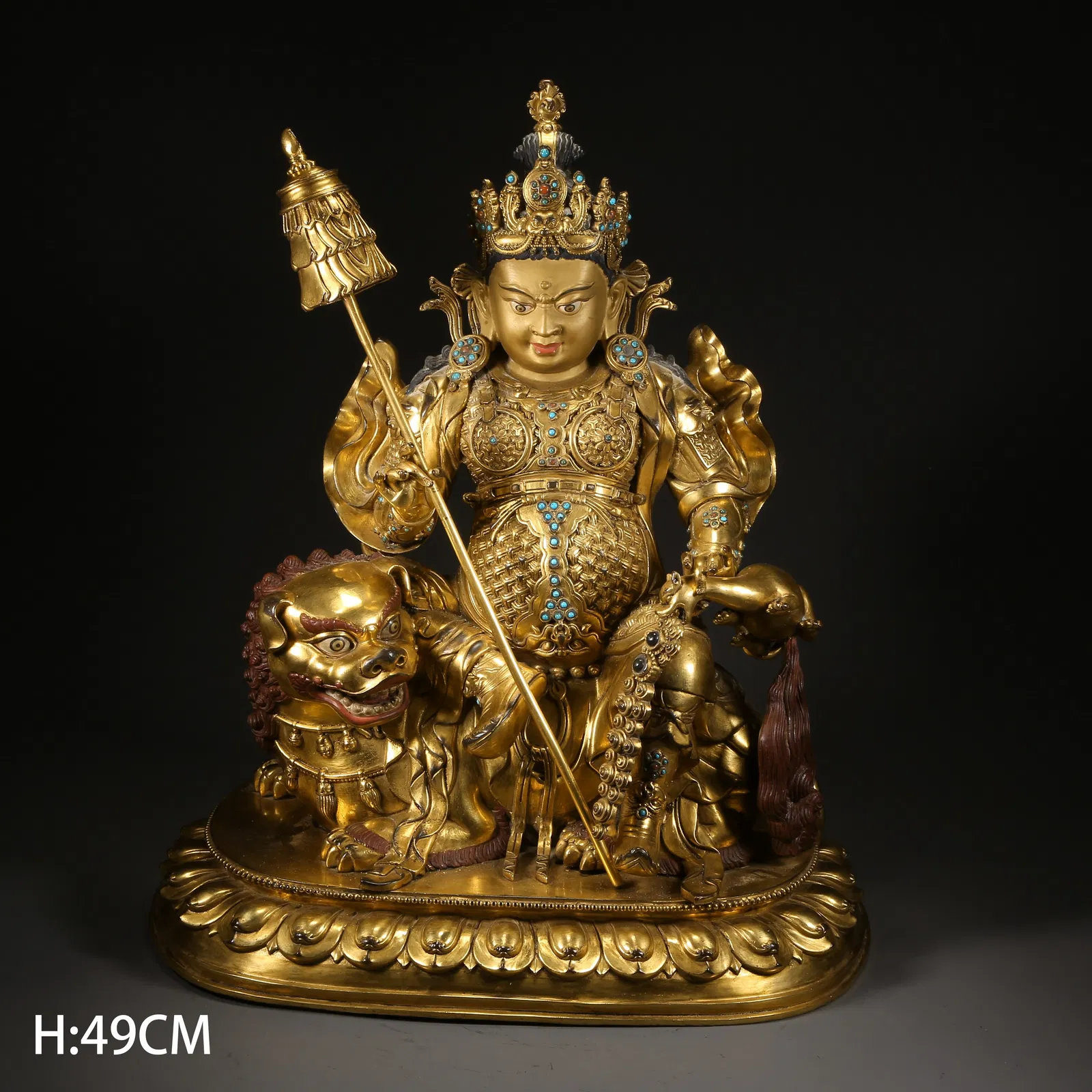 A GILDED BRONZE WEALTH KING STATUE