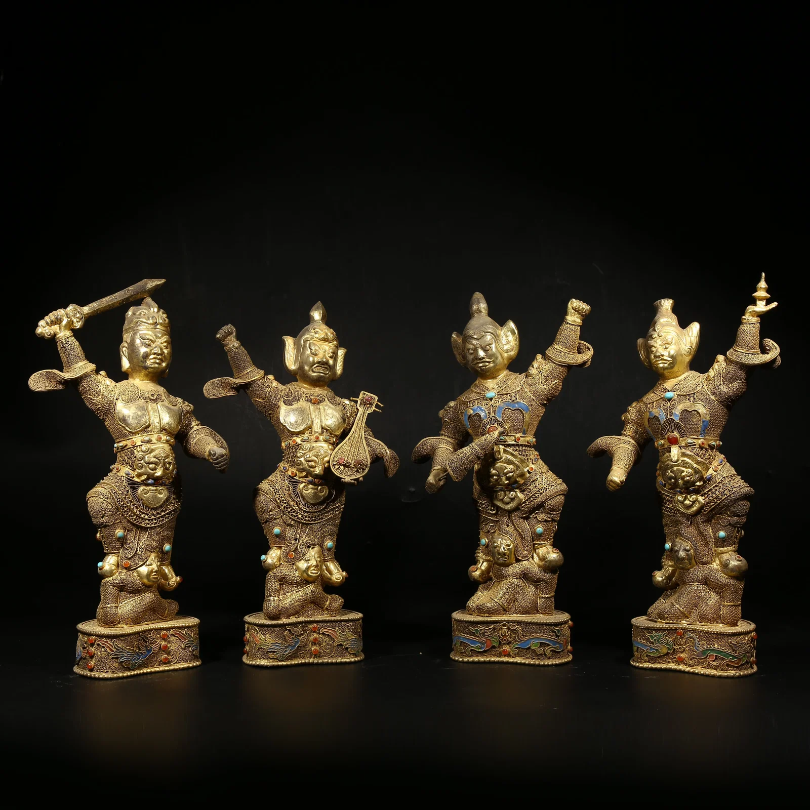 A GILDED SILVER FILIGREE CLOISONNÉ SET OF THE FOUR HEAVENLY KINGS