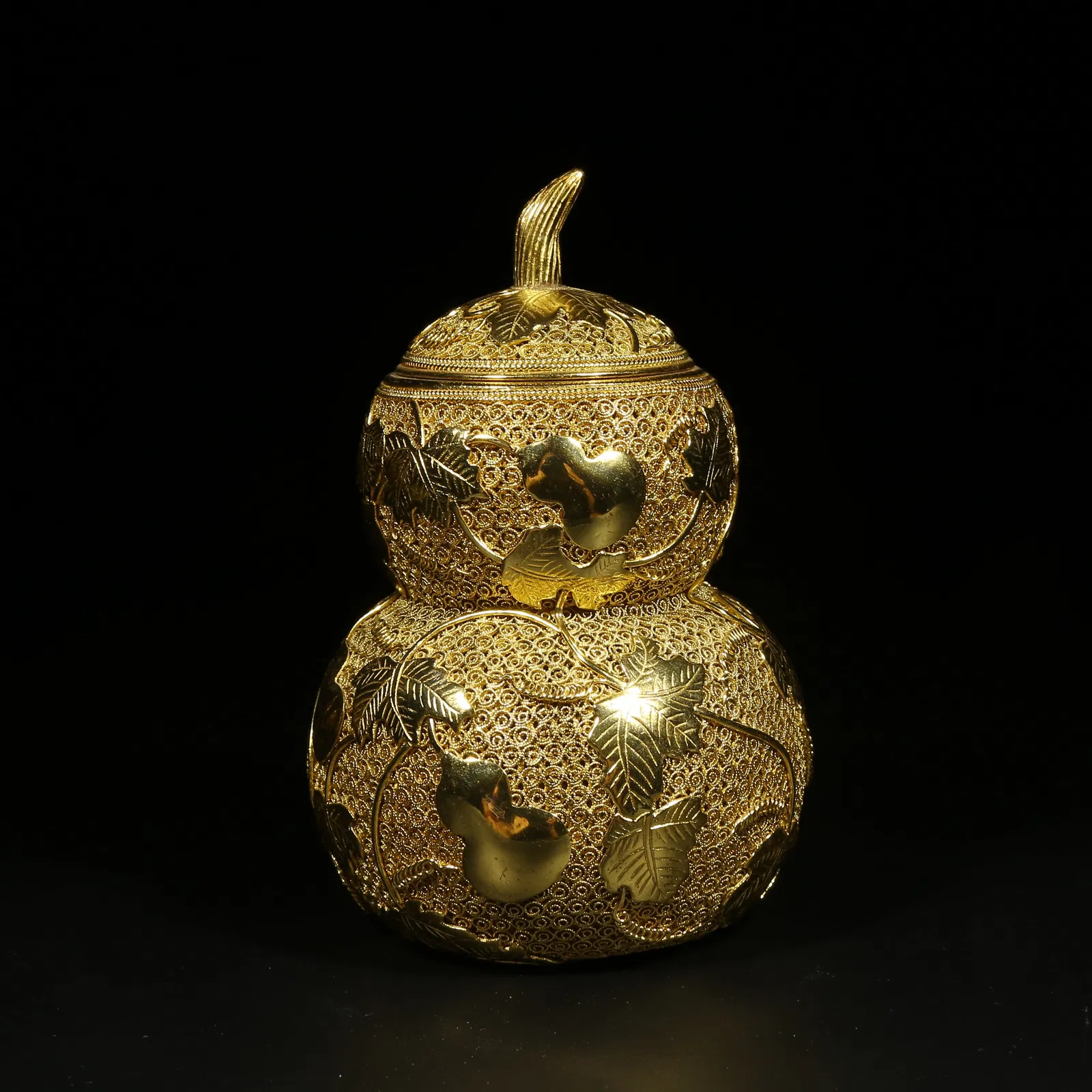 A GILDED SILVER FILIGREE GOURD