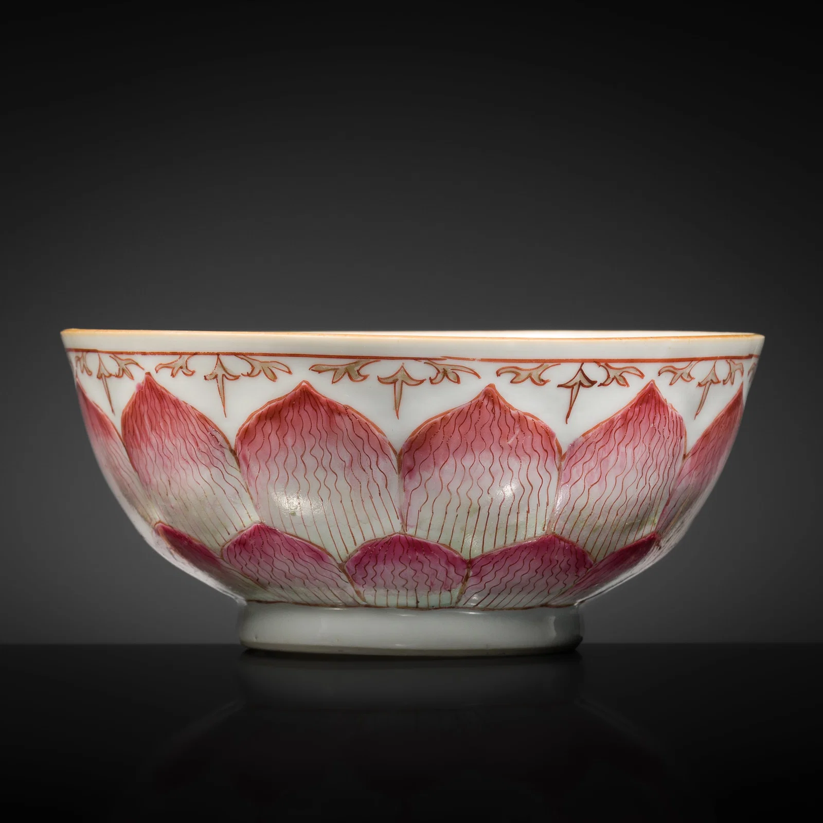 A GILT AND MOLDED FAMILLE-ROSE 'LOTUS PETALS' BOWL, 18TH CENTURY