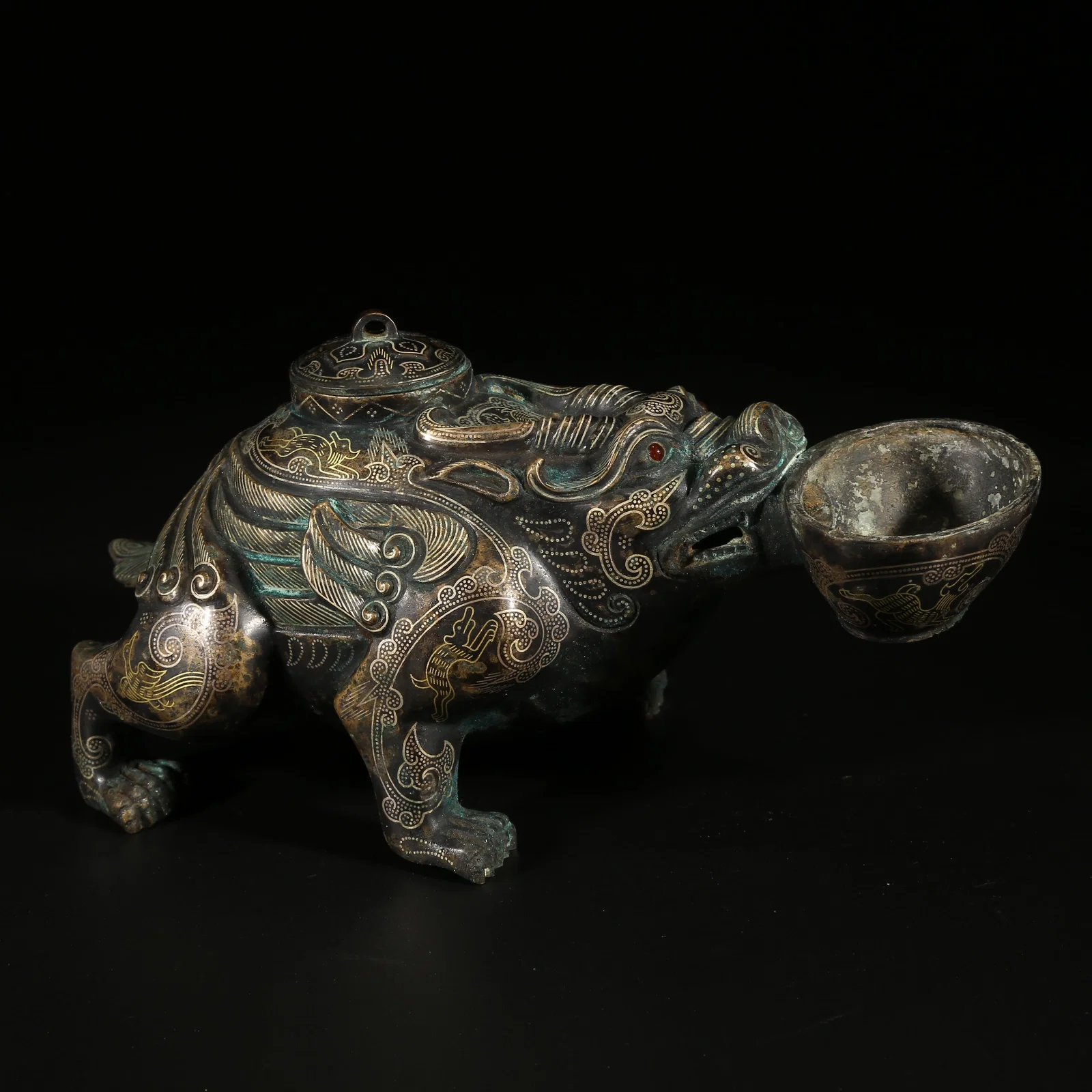 A GILT AND SILVER INLAID BRONZE BIXI INK DROPPER