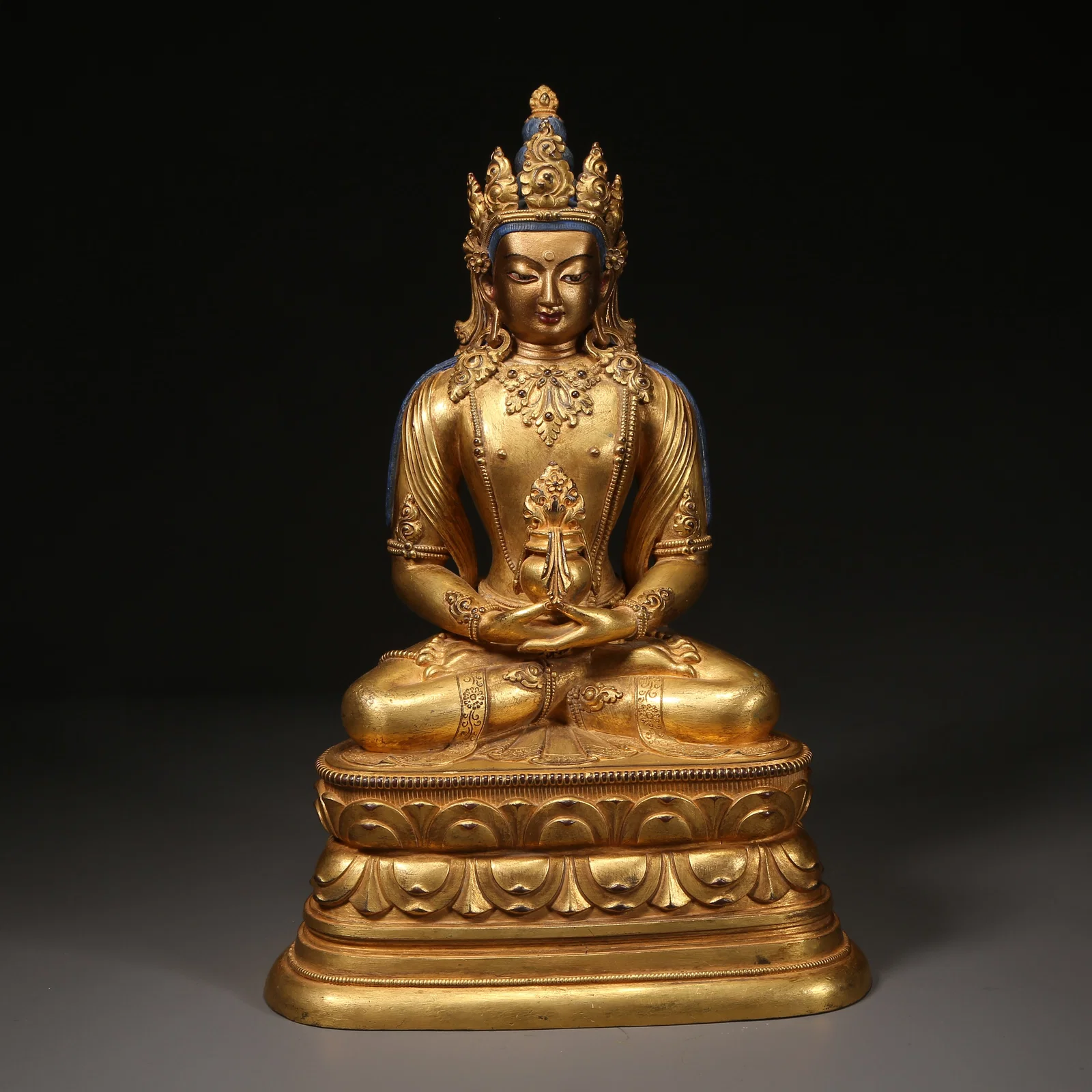 A GILT-BRONZE AMITAYUS STATUE IN ZANABAZAR STYLE