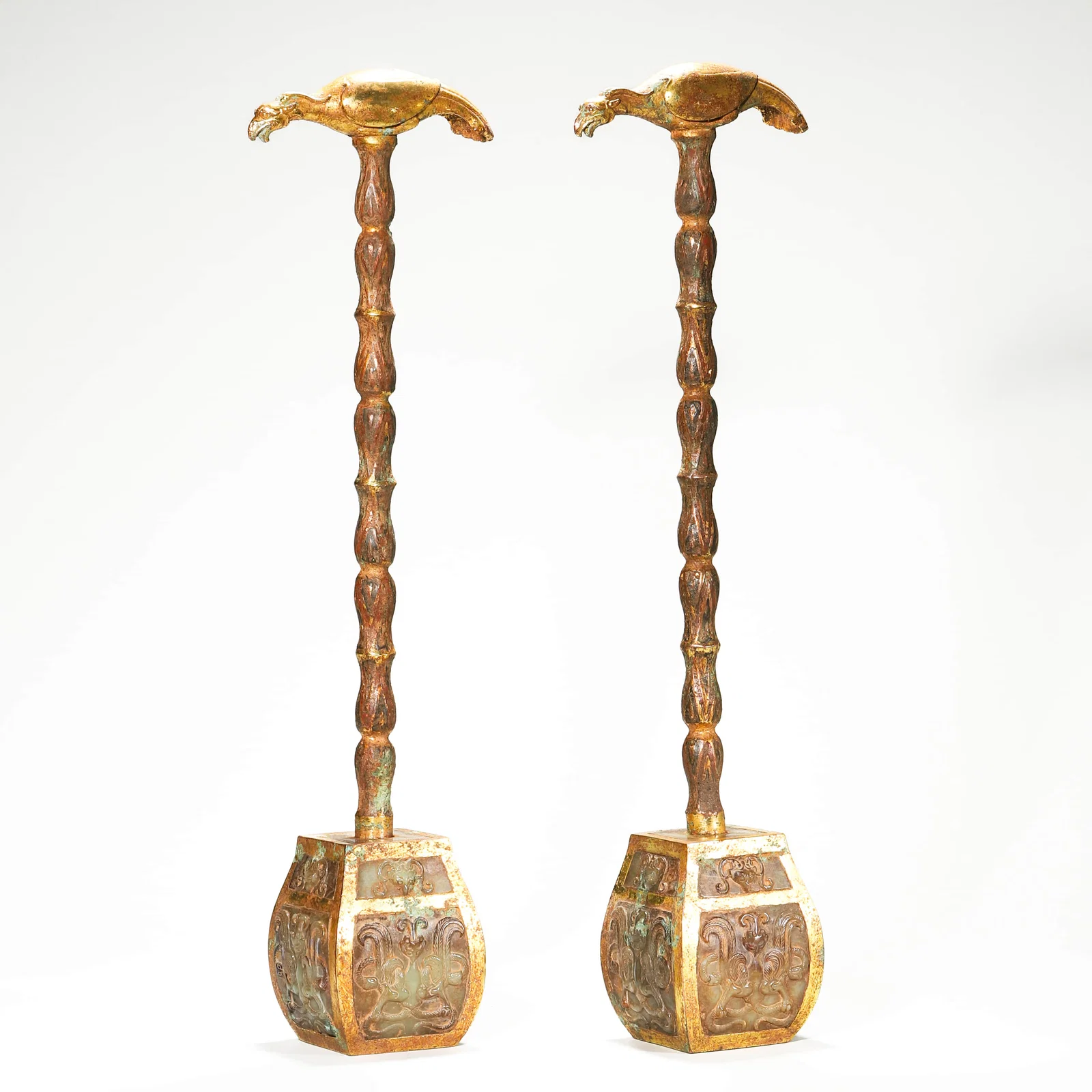 A GILT-BRONZE AND JADE-INSET WINE VESSEL.