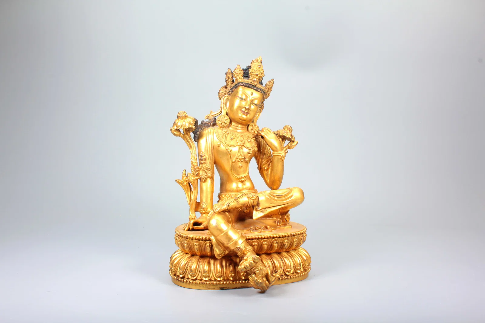A GILT-BRONZE AVALOKITESVARA STATUE