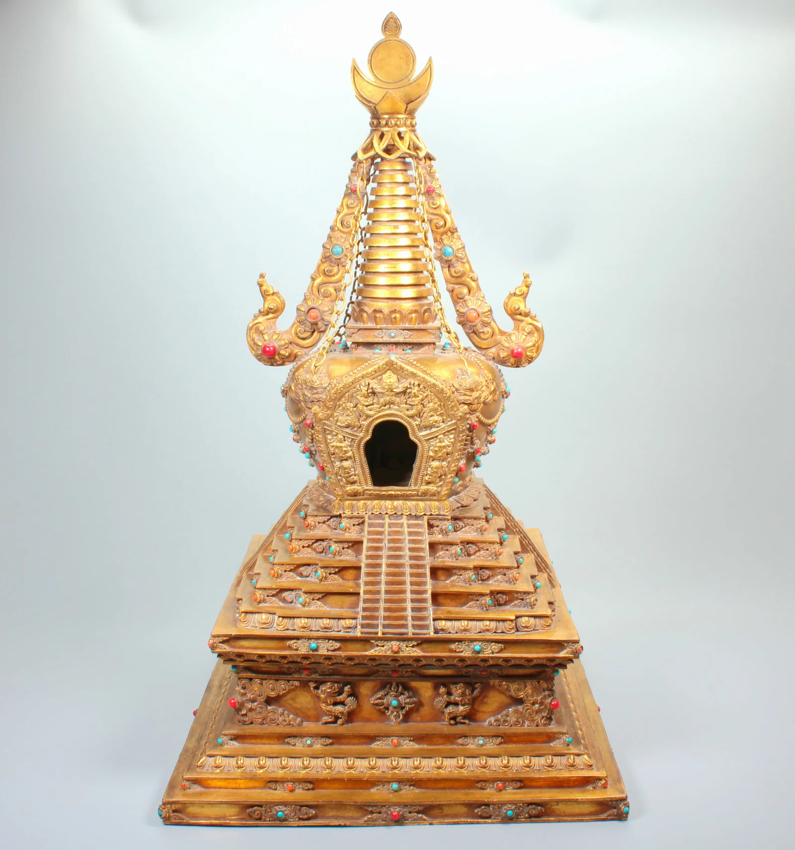 A GILT BRONZE BUDDHA PAGODA