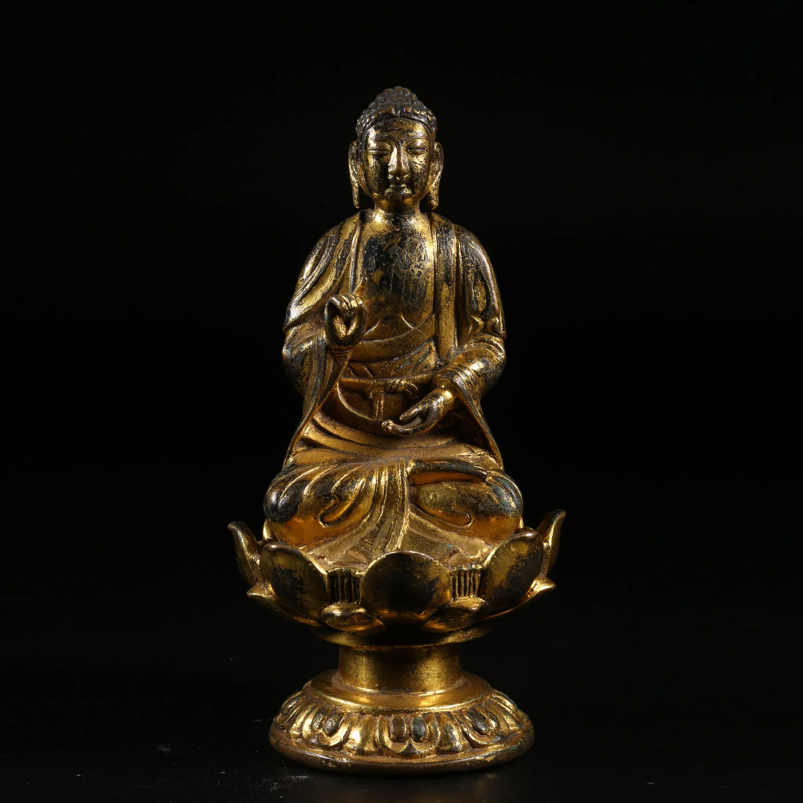 A GILT-BRONZE BUDDHA STATUE