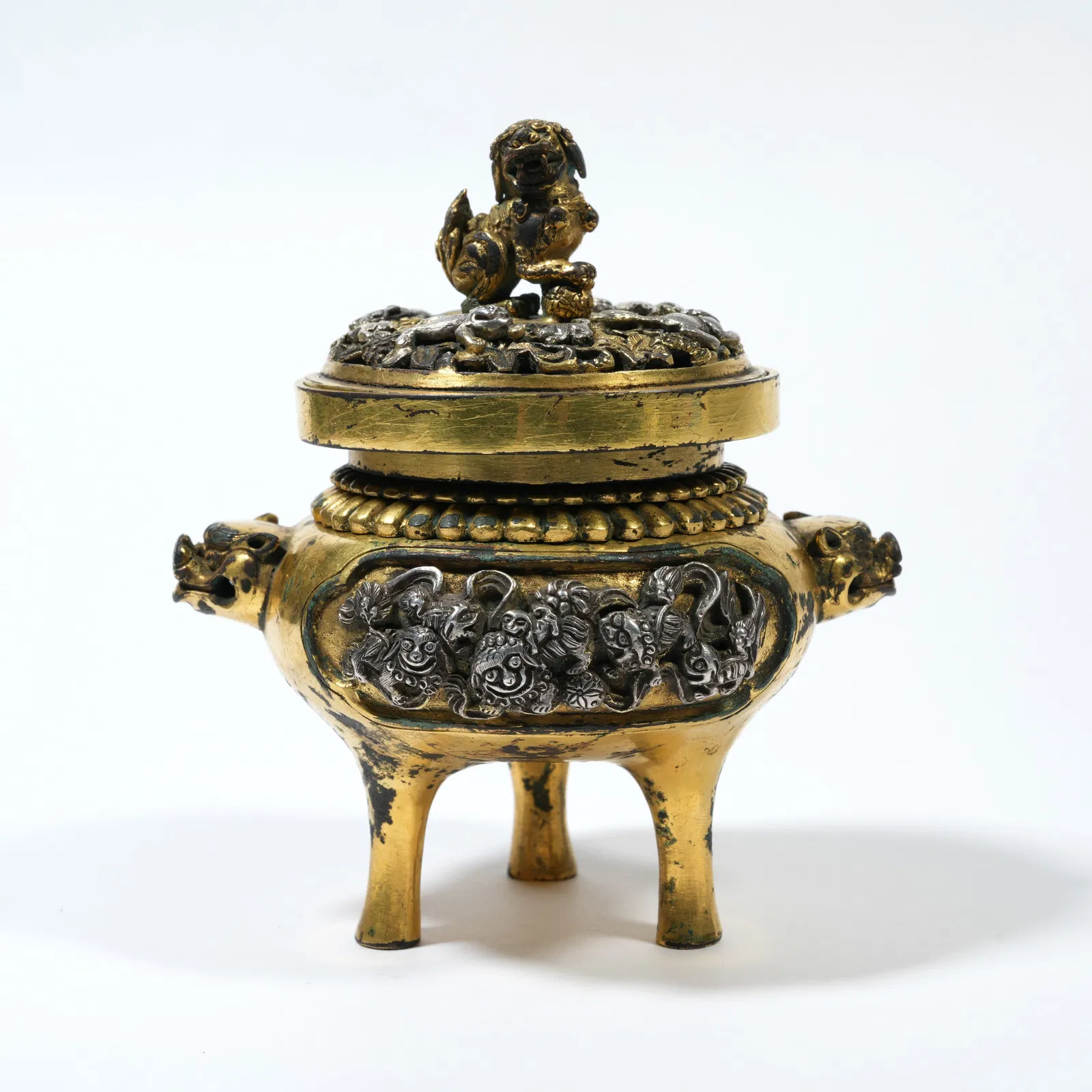 A GILT-BRONZE CENSER WITH BEAST-FORM FINIAL