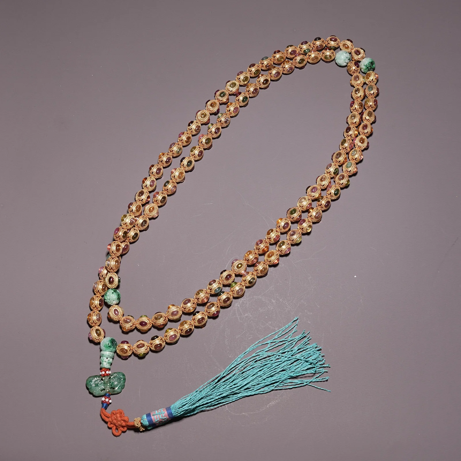 A GILT BRONZE COURT NECKLACE INLAID WITH TOURMALINE