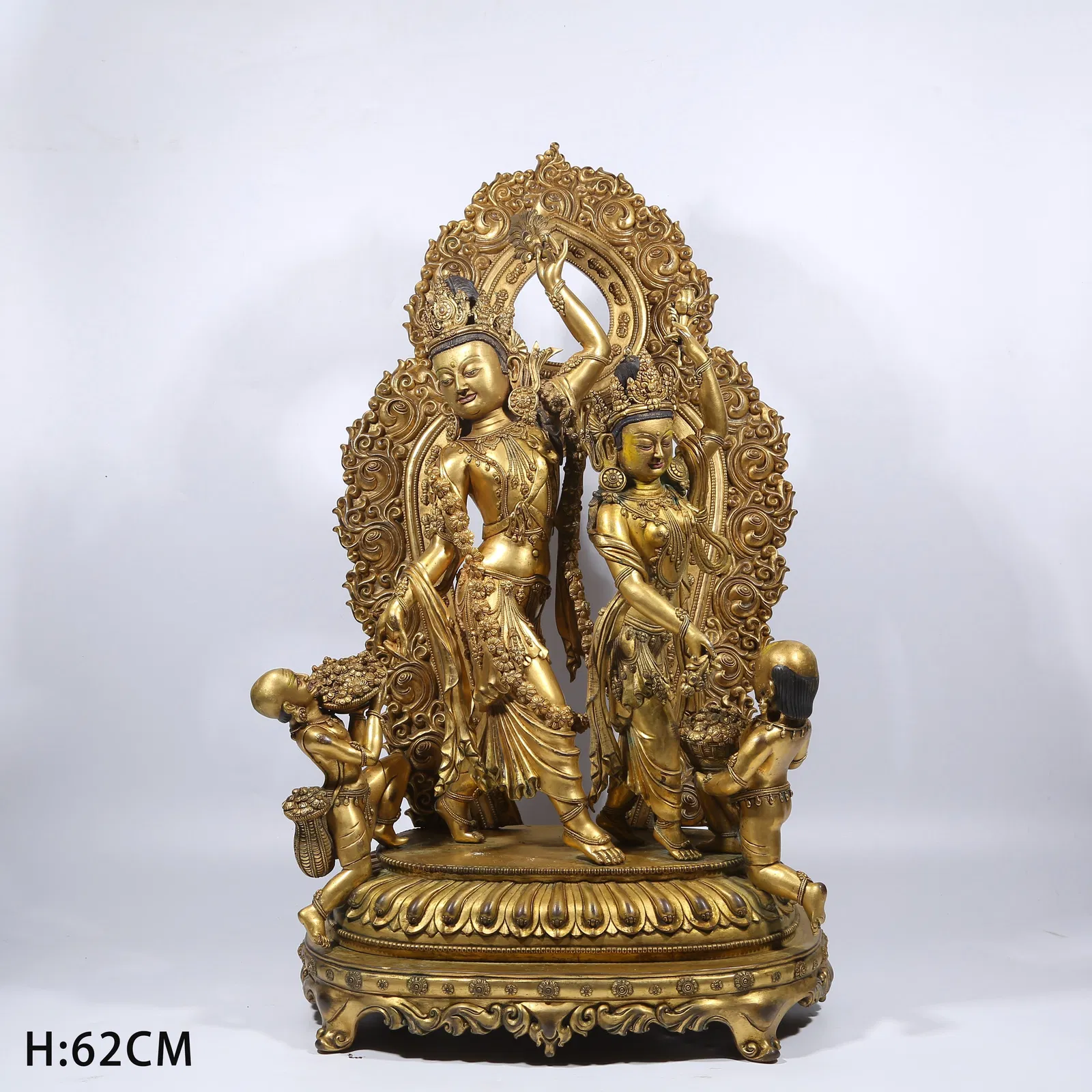A GILT BRONZE DANCING AVALOKITESHVARA STATUE