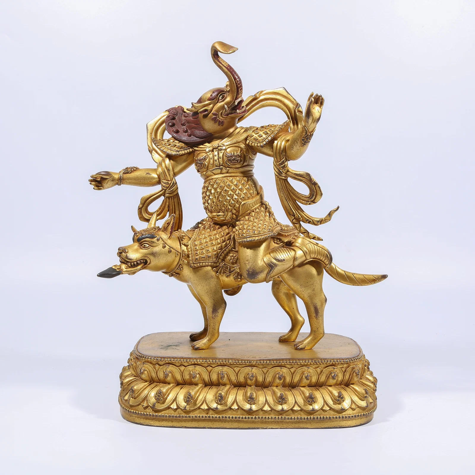 A GILT BRONZE DHARMA PROTECTOR STATUE