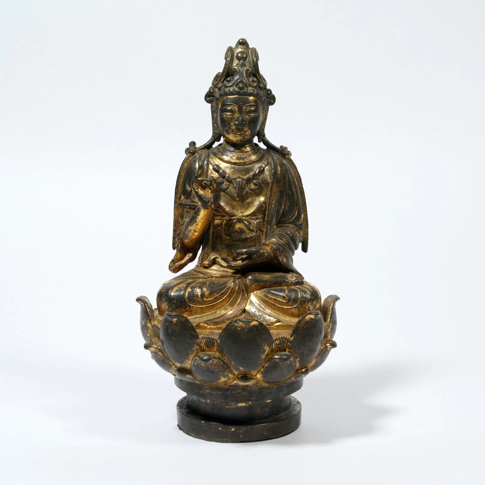 A GILT-BRONZE FIGURE OF A BODHISATTVA