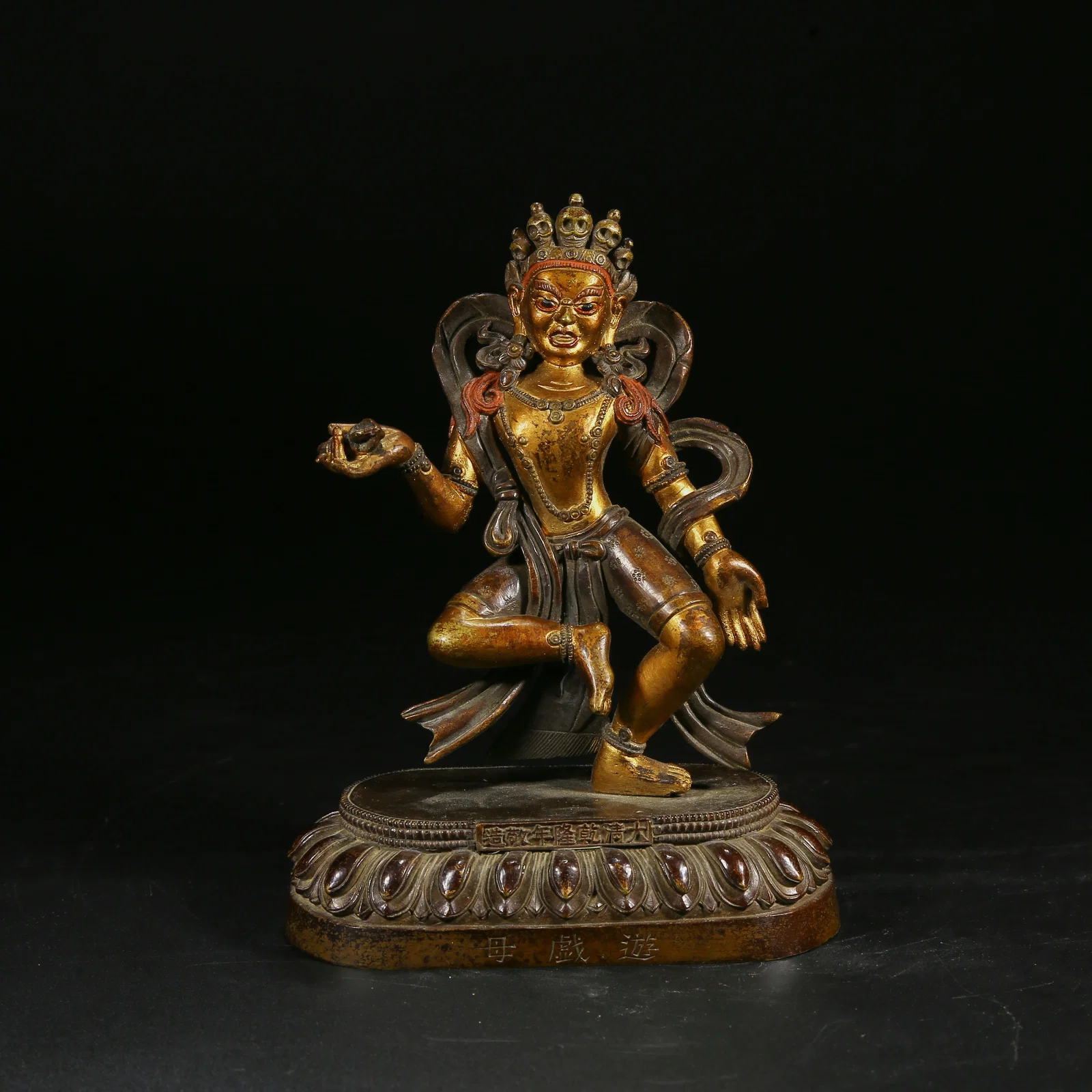 A GILT BRONZE FIGURE OF A MOTHER PLAYING WITH CHILDREN