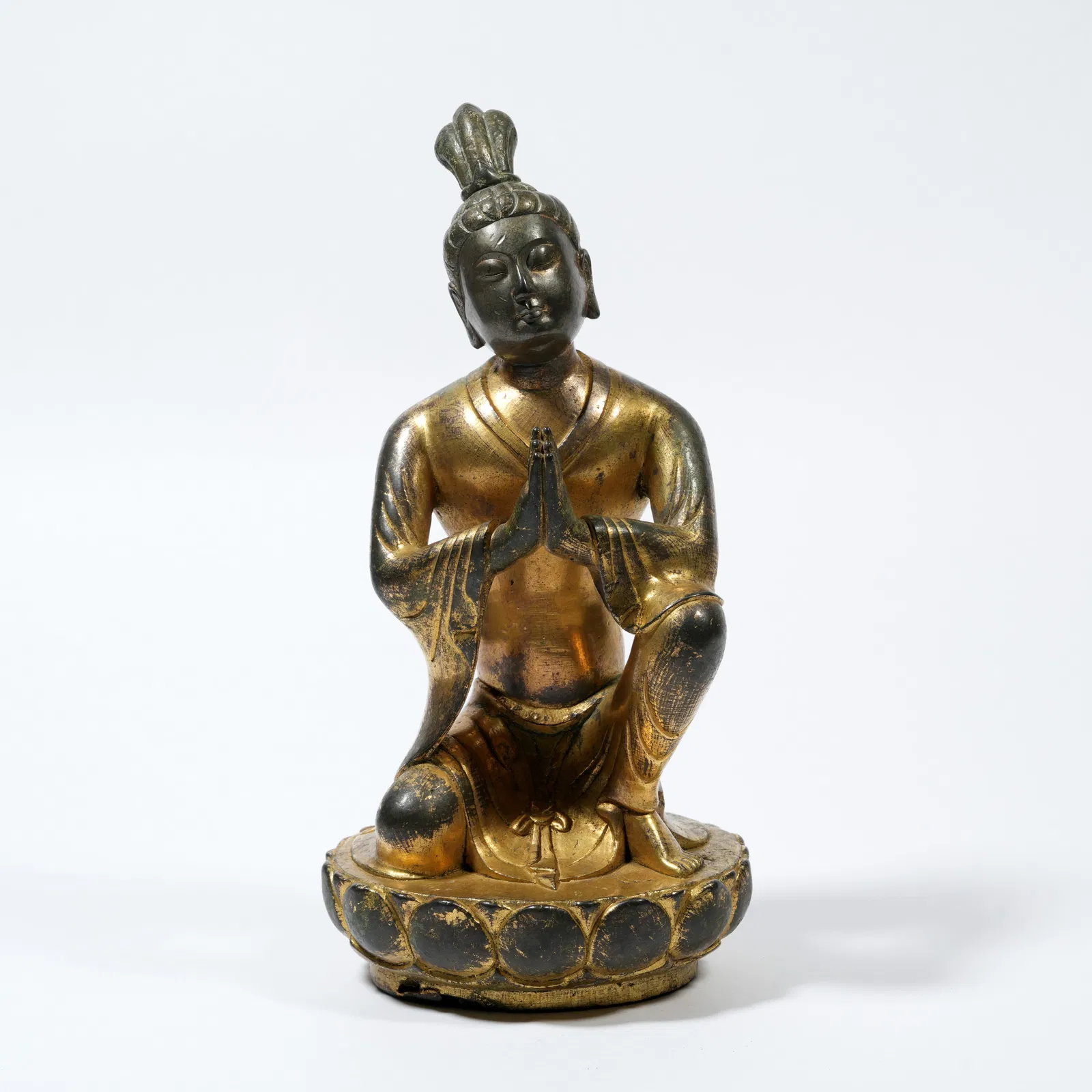 A GILT-BRONZE FIGURE OF AN OFFERING BODHISATTVA