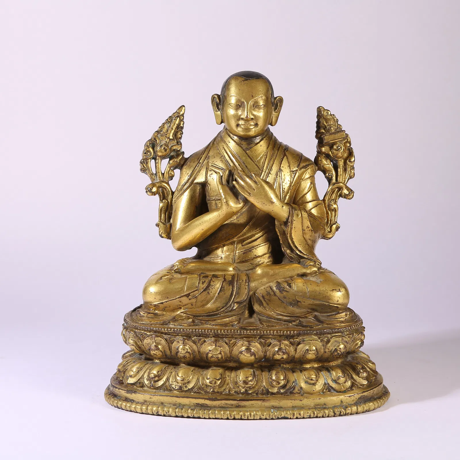 A GILT-BRONZE FIGURE OF JE TSONGKHAPA