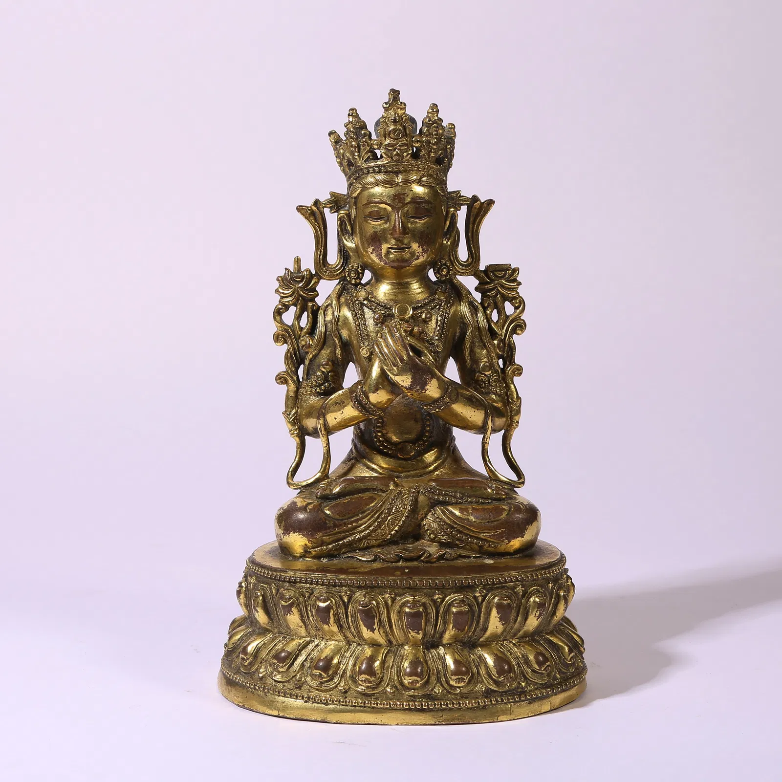 A GILT-BRONZE FIGURE OF MANJUSHRI BODHISATTVA
