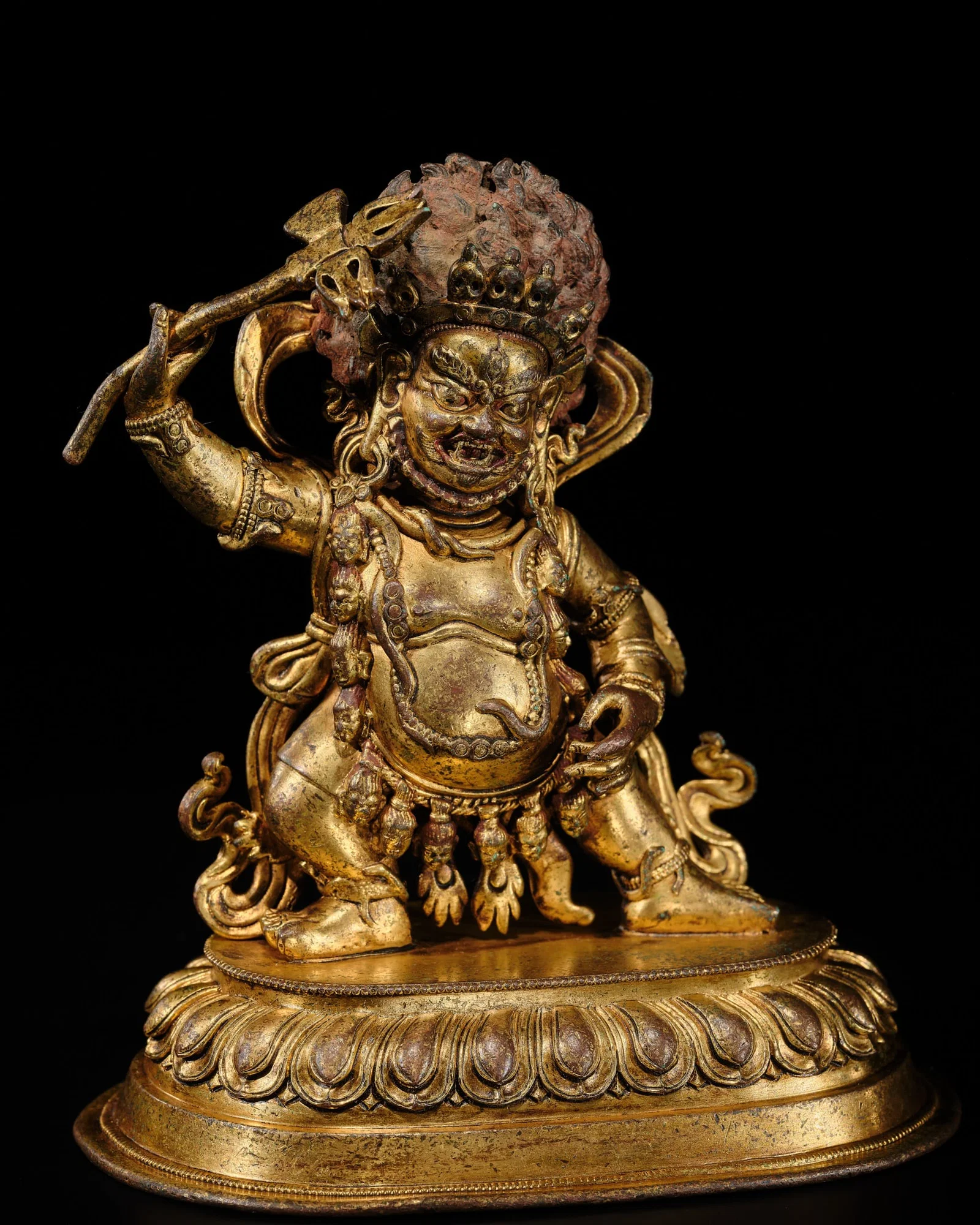 A GILT-BRONZE FIGURE OF NILAMBARA VAJRAPANI, TIBET, 16TH-17TH CENTURY