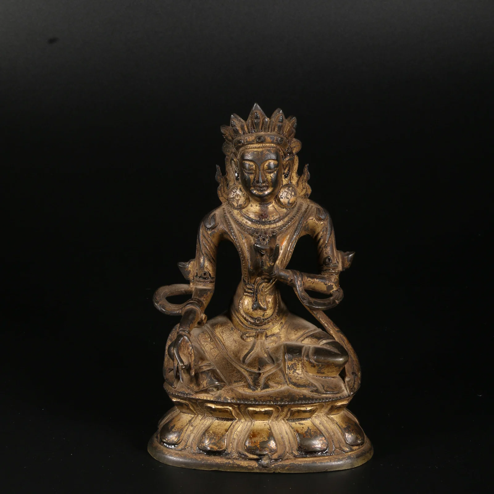 A GILT-BRONZE GREEN TARA STATUE