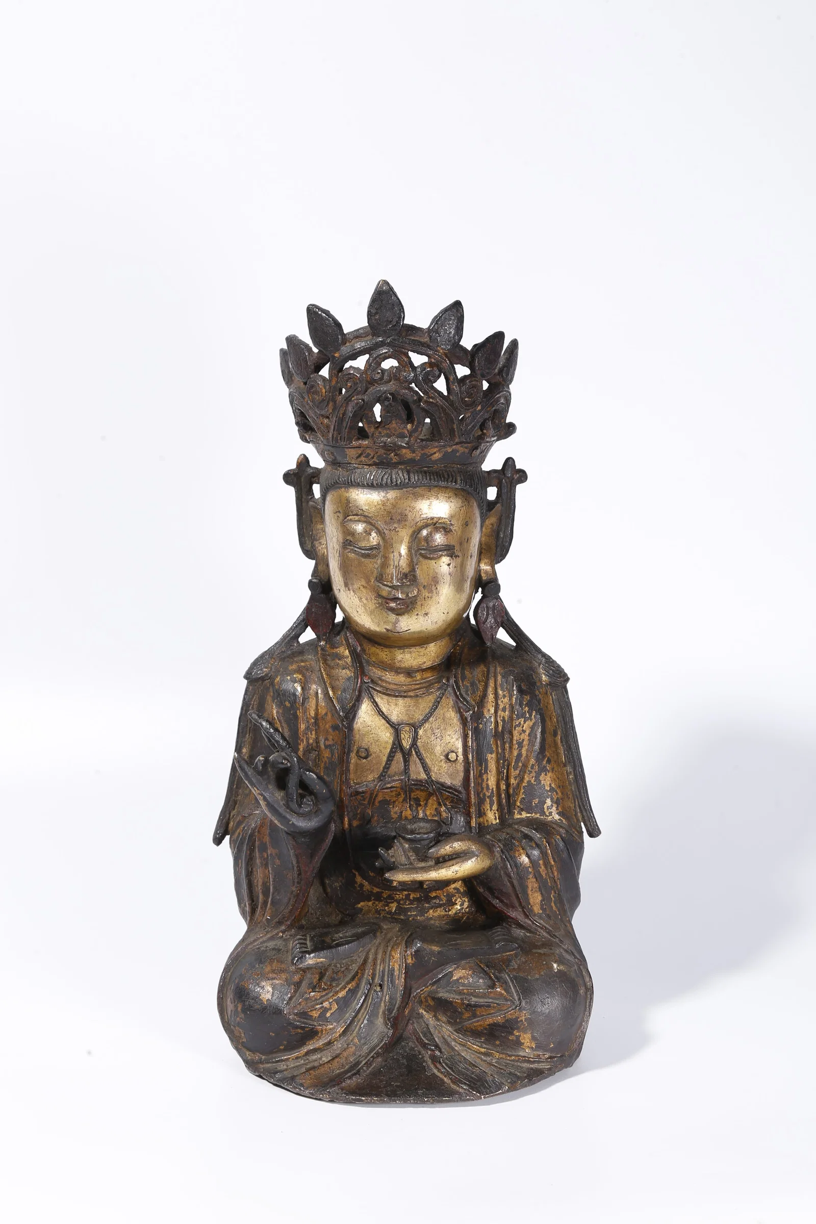 A GILT BRONZE GUANYIN FIGURE