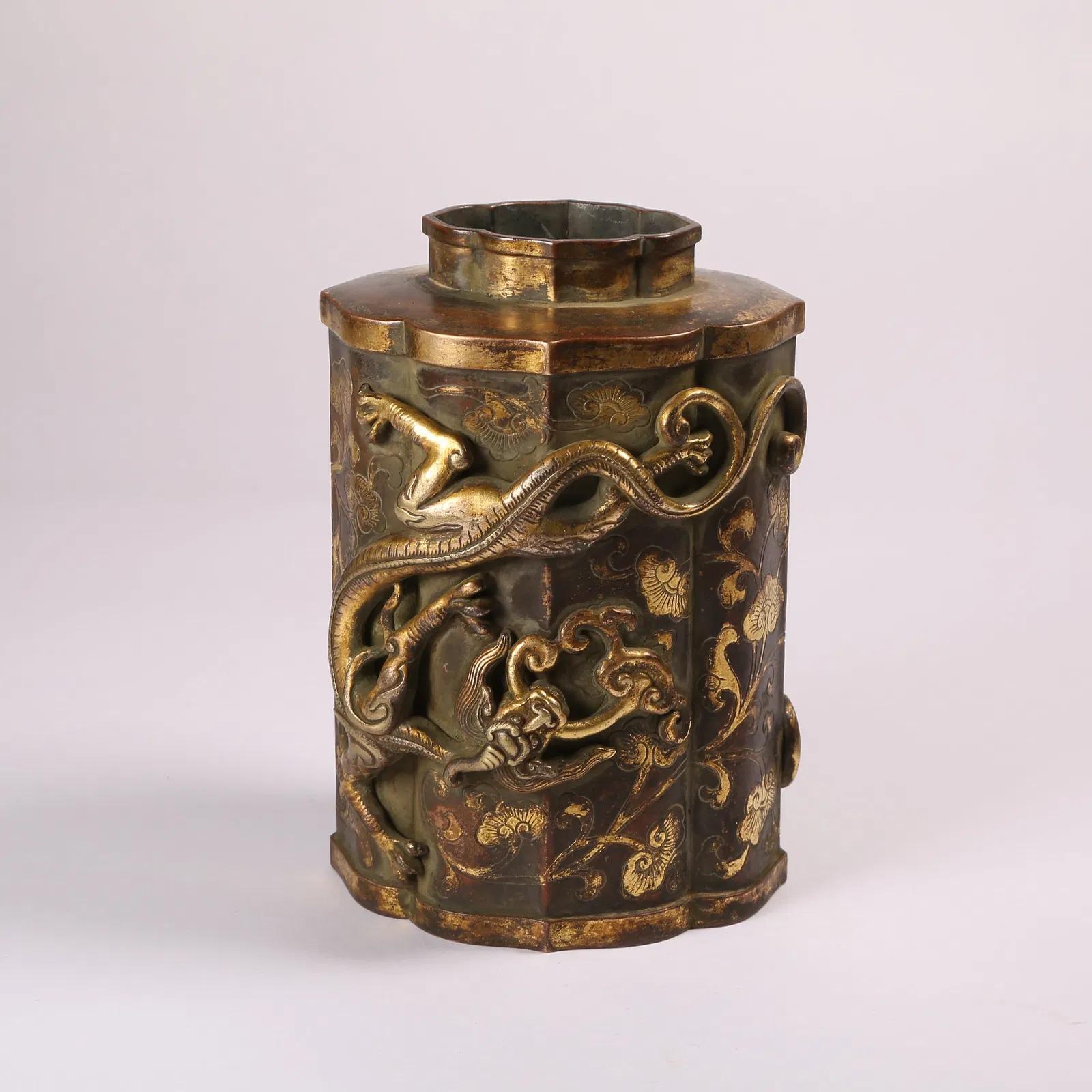 A GILT BRONZE JAR WITH CHI DRAGON MOTIF