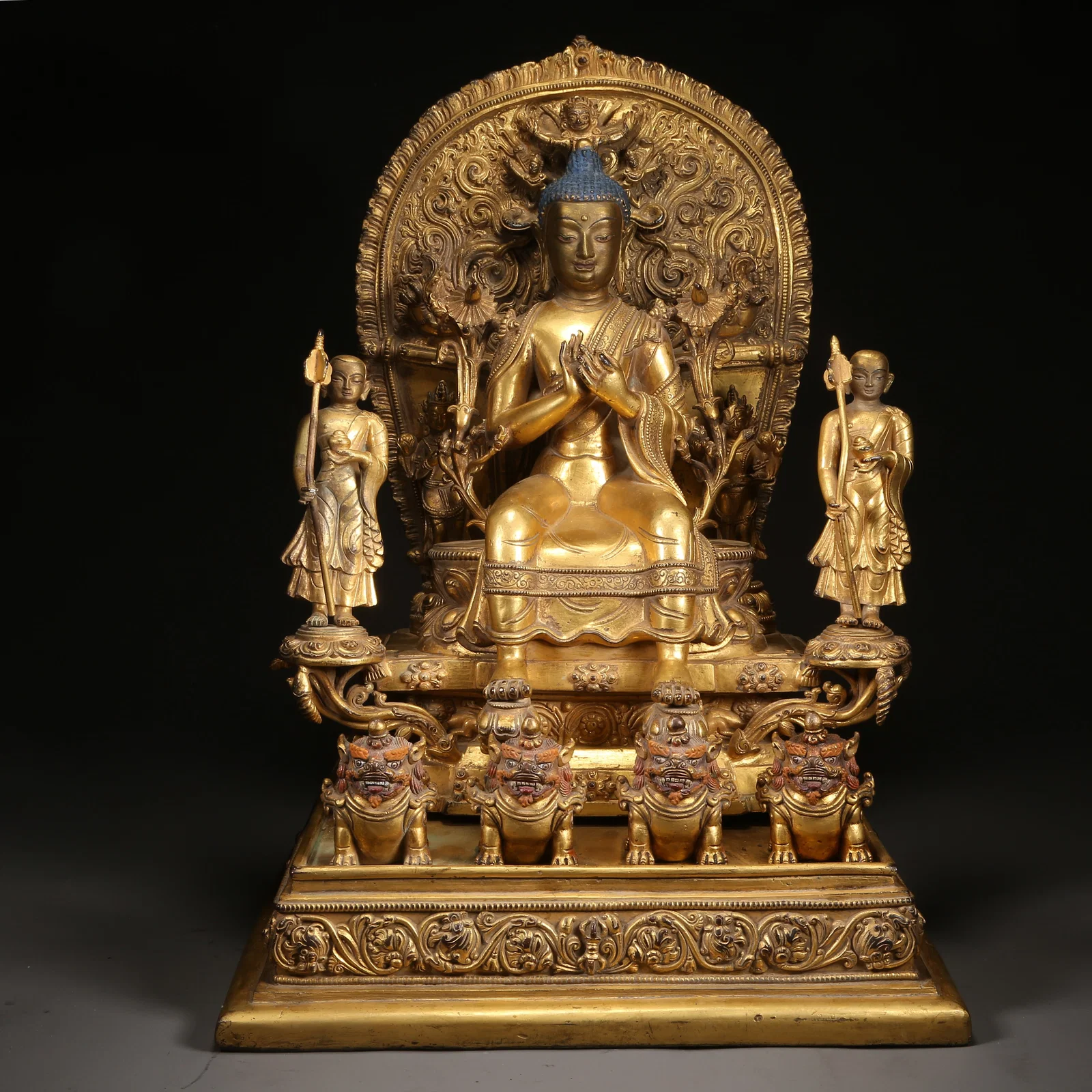 A GILT-BRONZE MAITREYA BUDDHA STATUE