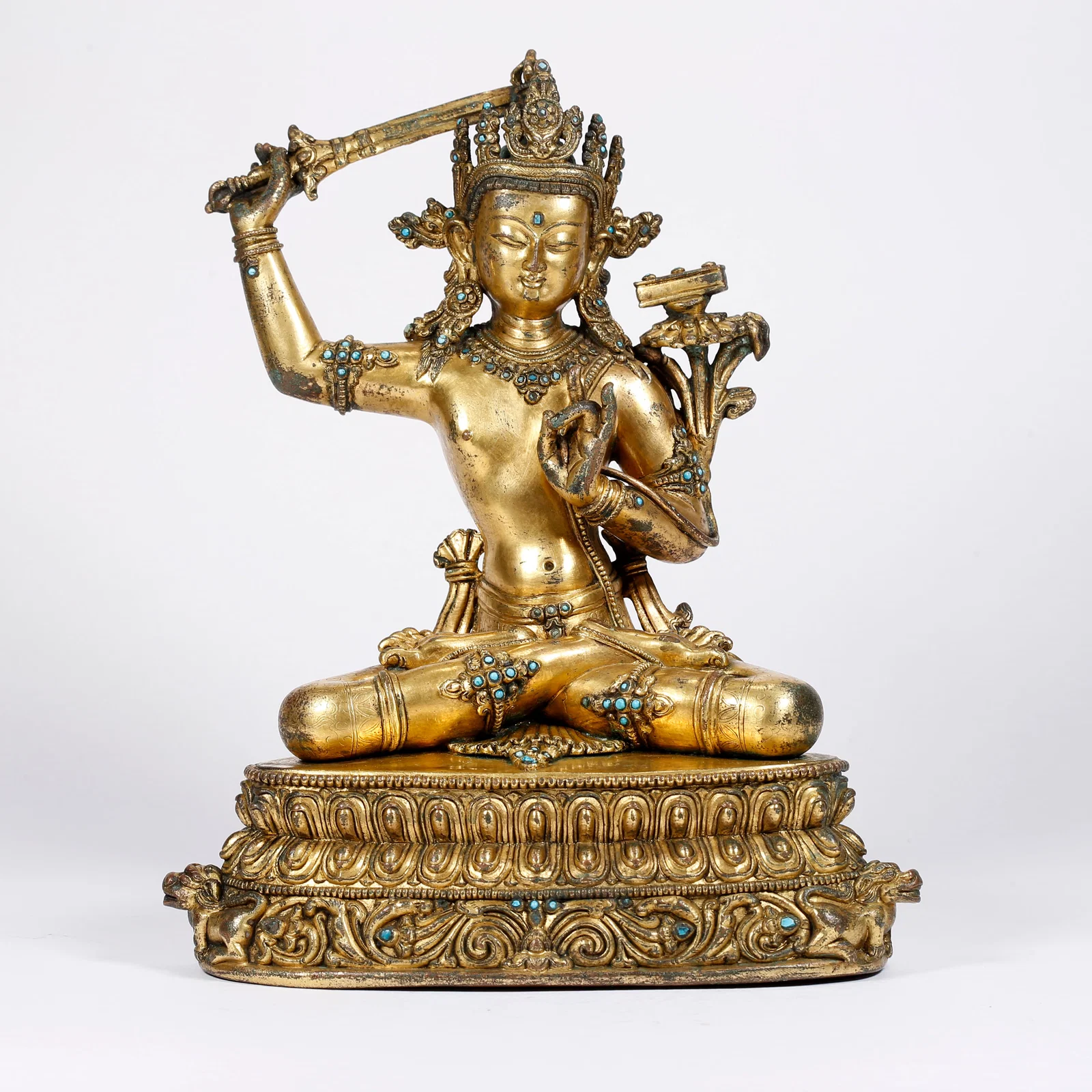 A GILT BRONZE MANJUSHRI P??? STATUE