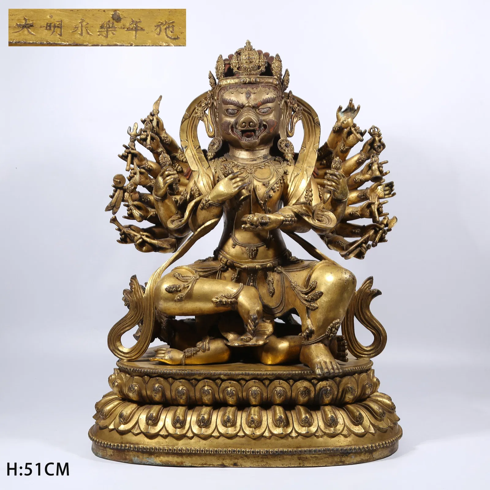 A GILT BRONZE SOW-FACED DAKINI STATUE