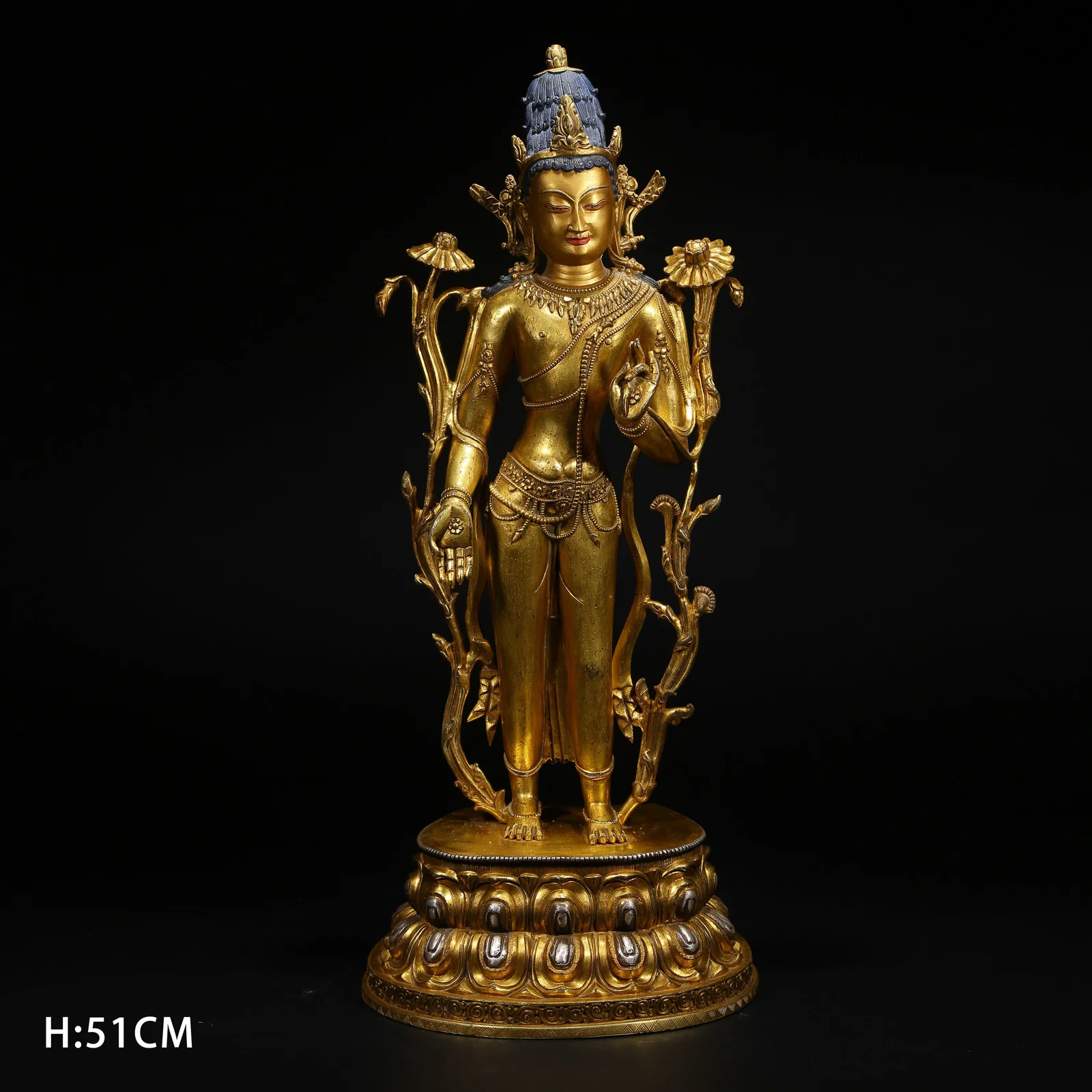 A GILT BRONZE STANDING AVALOKITESHVARA STATUE INLAID WITH SILVER