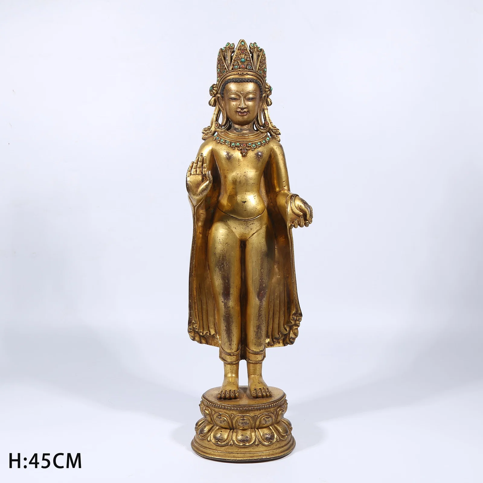 A GILT BRONZE STANDING CROWNED SHAKYAMUNI STATUE