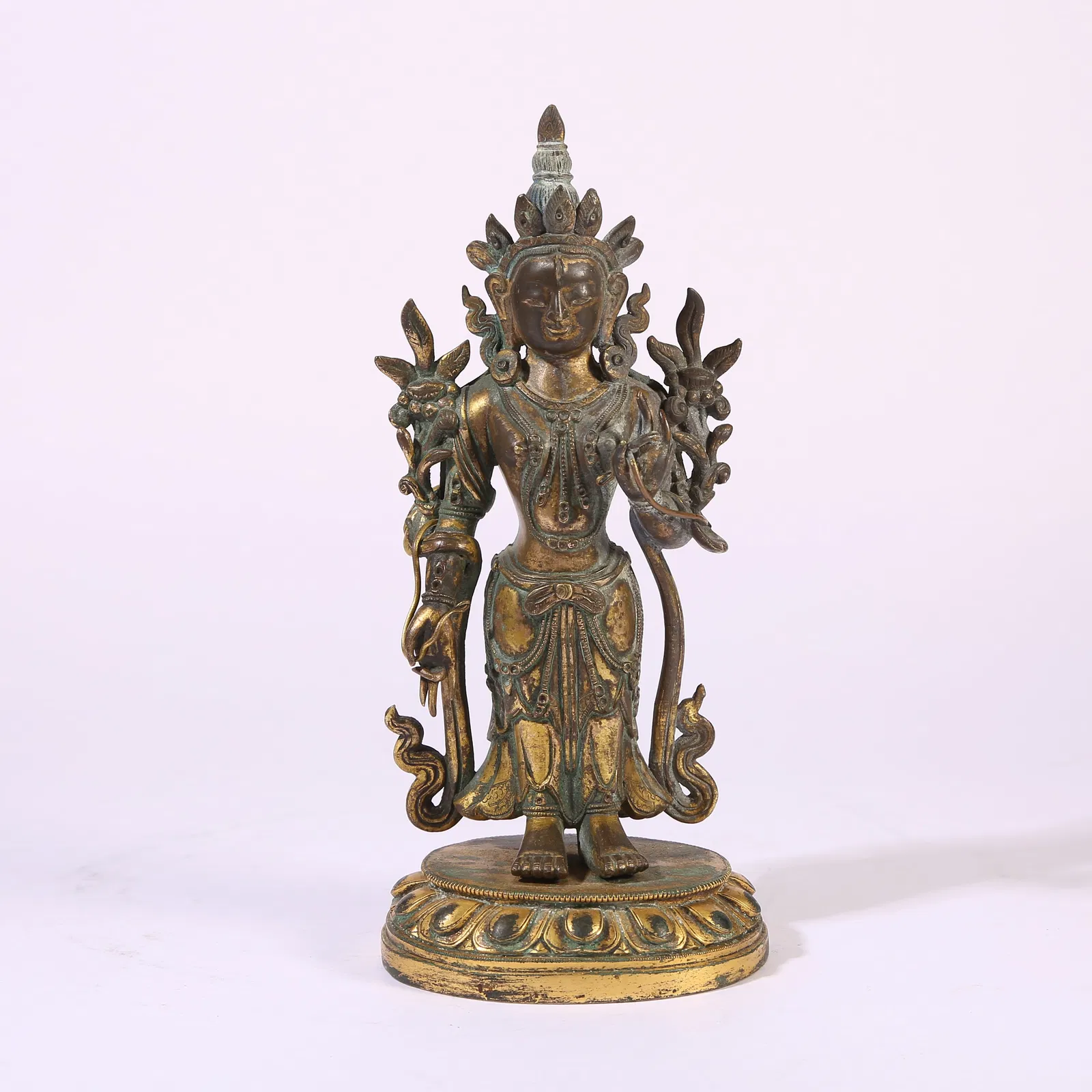 A GILT-BRONZE STANDING FIGURE OF MAITREYA BODHISATTVA