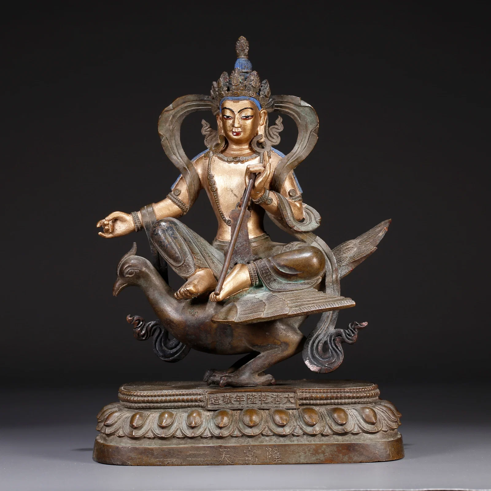 A GILT BRONZE STATUE OF BUDDHA