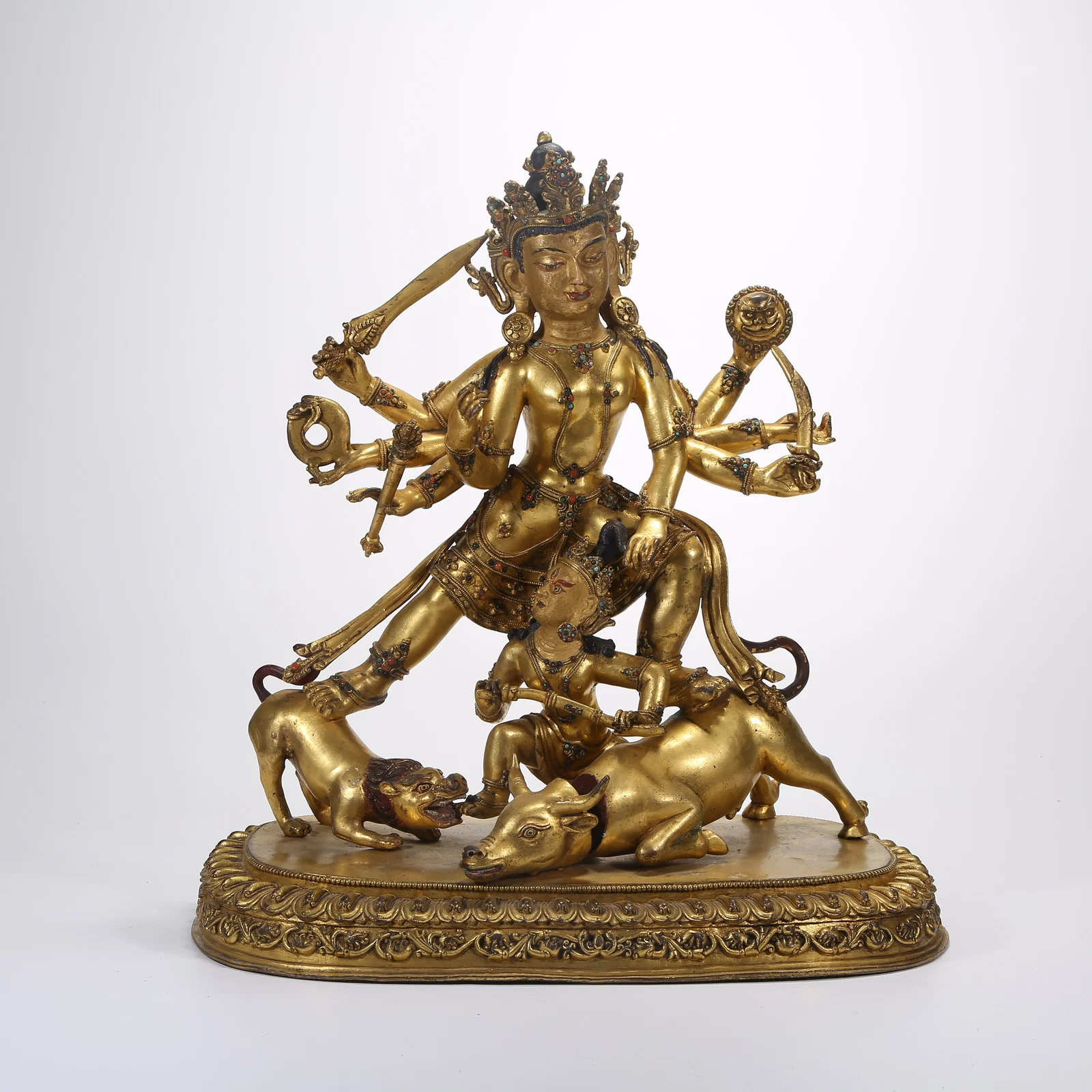 A GILT BRONZE STATUE OF DURGA