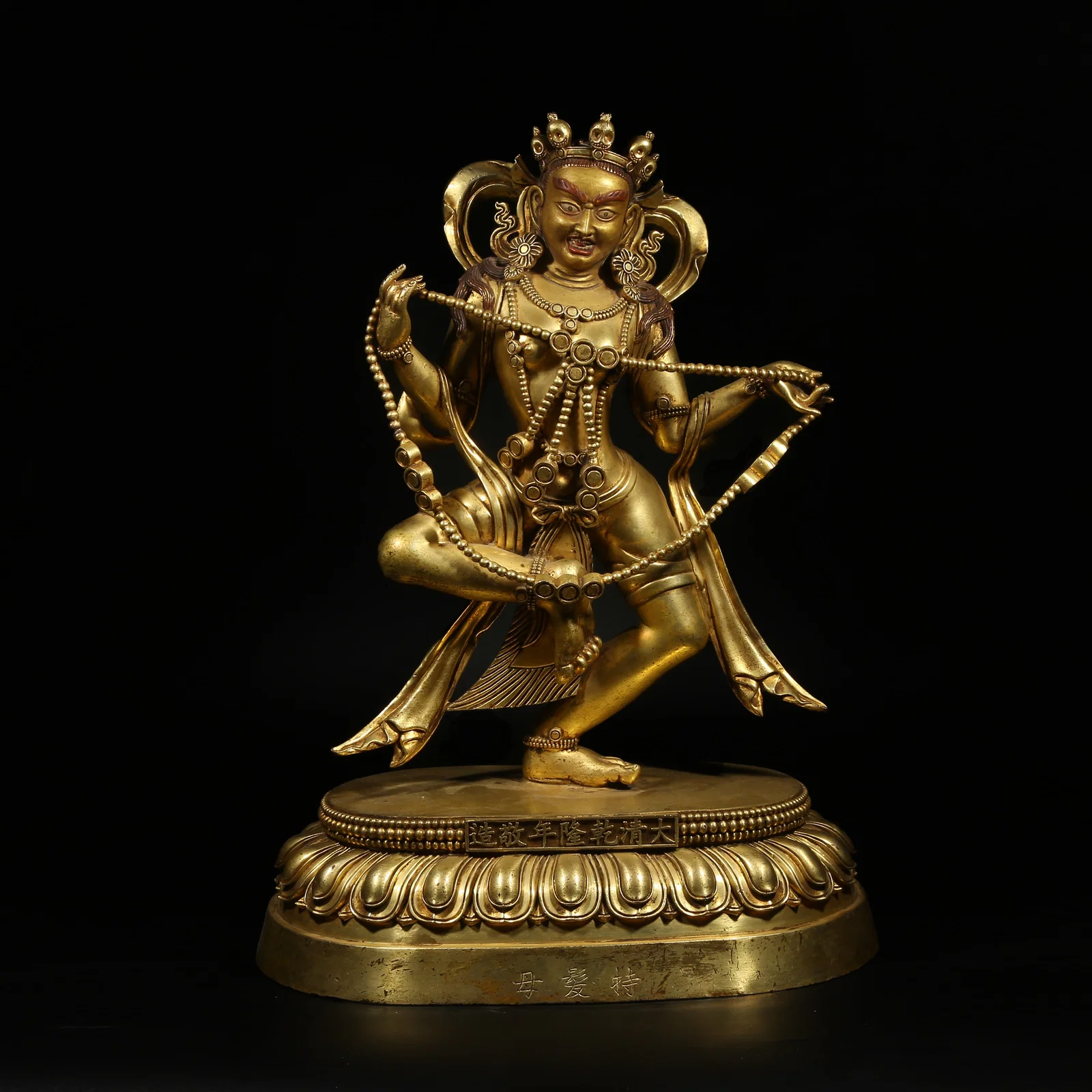 A GILT-BRONZE STATUE OF HARITI