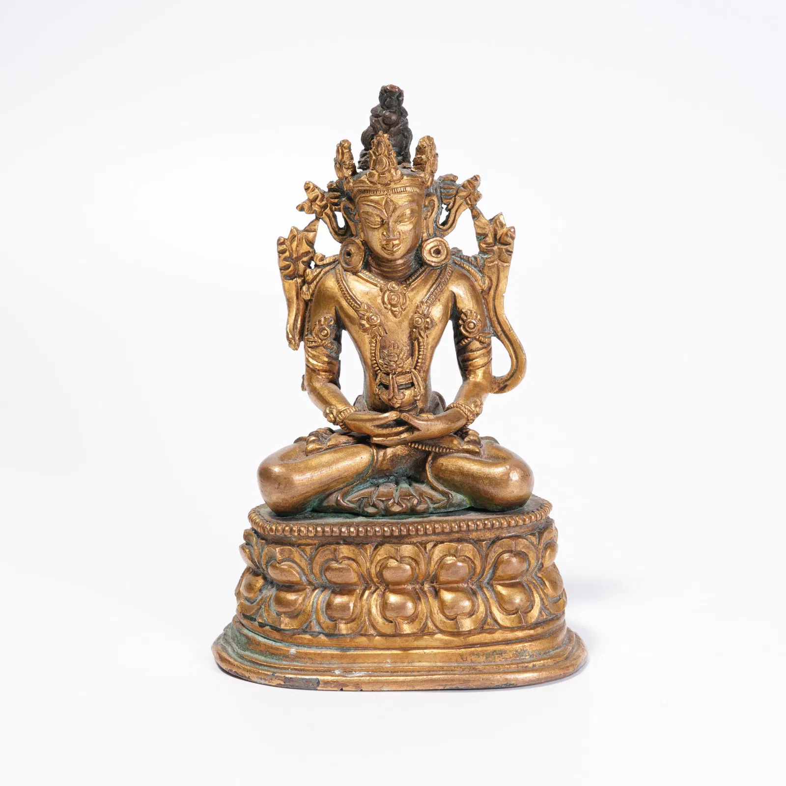 A GILT BRONZE STATUE OF MEDICINE BUDDHA