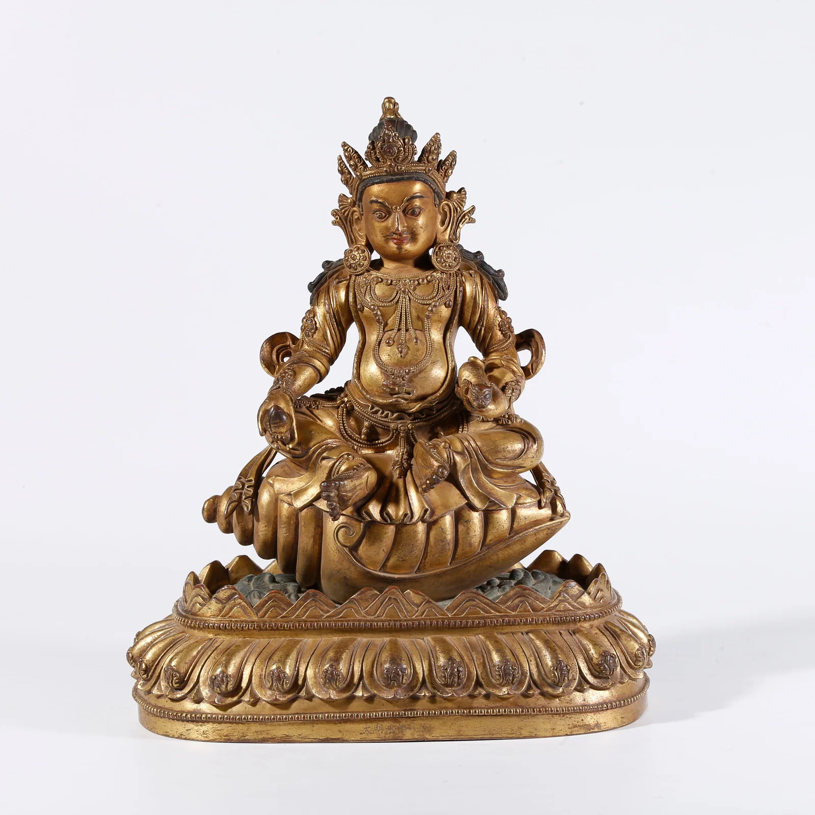 A GILT BRONZE STATUE OF THE GOD OF WEALTH