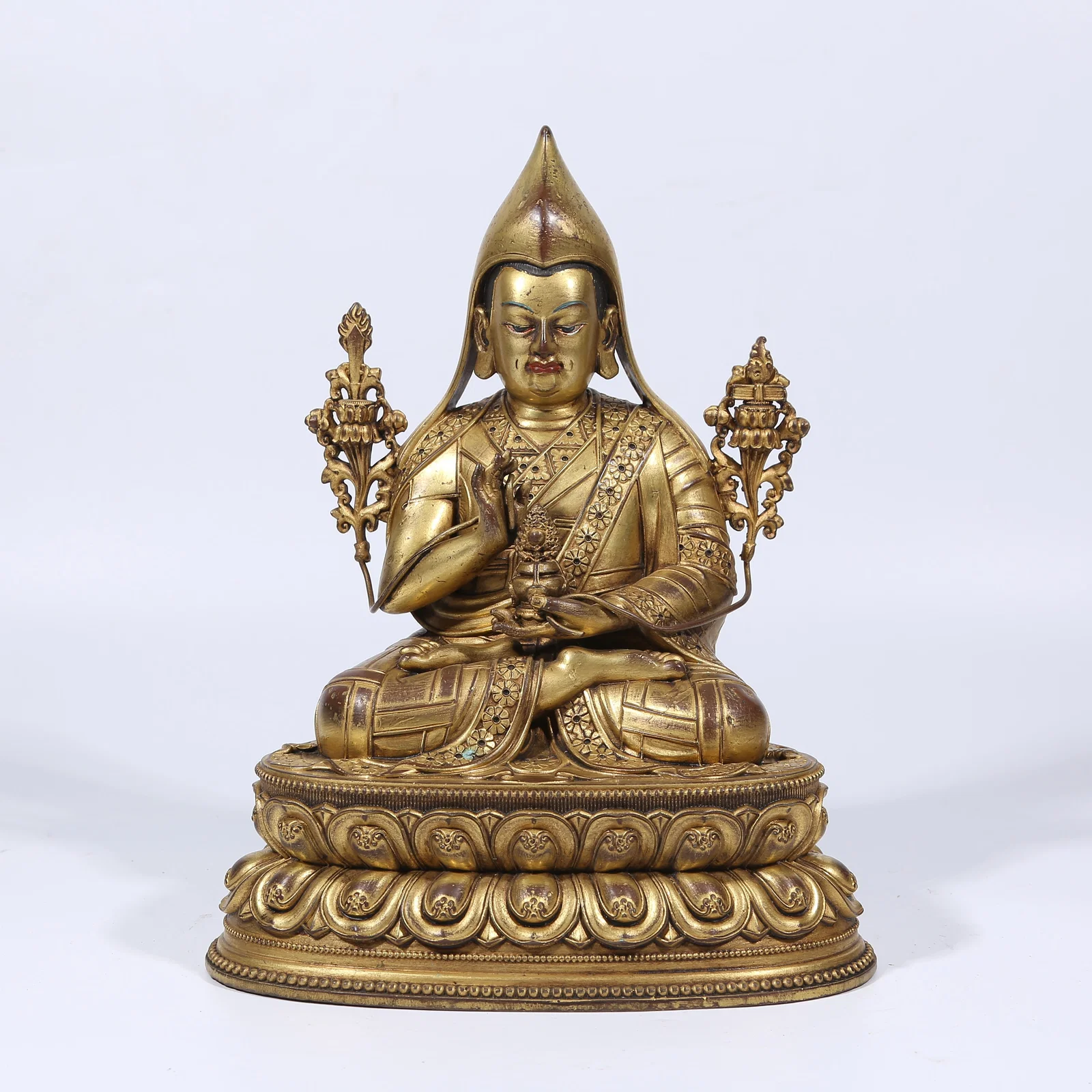 A GILT BRONZE TSONGKHAPA STATUE