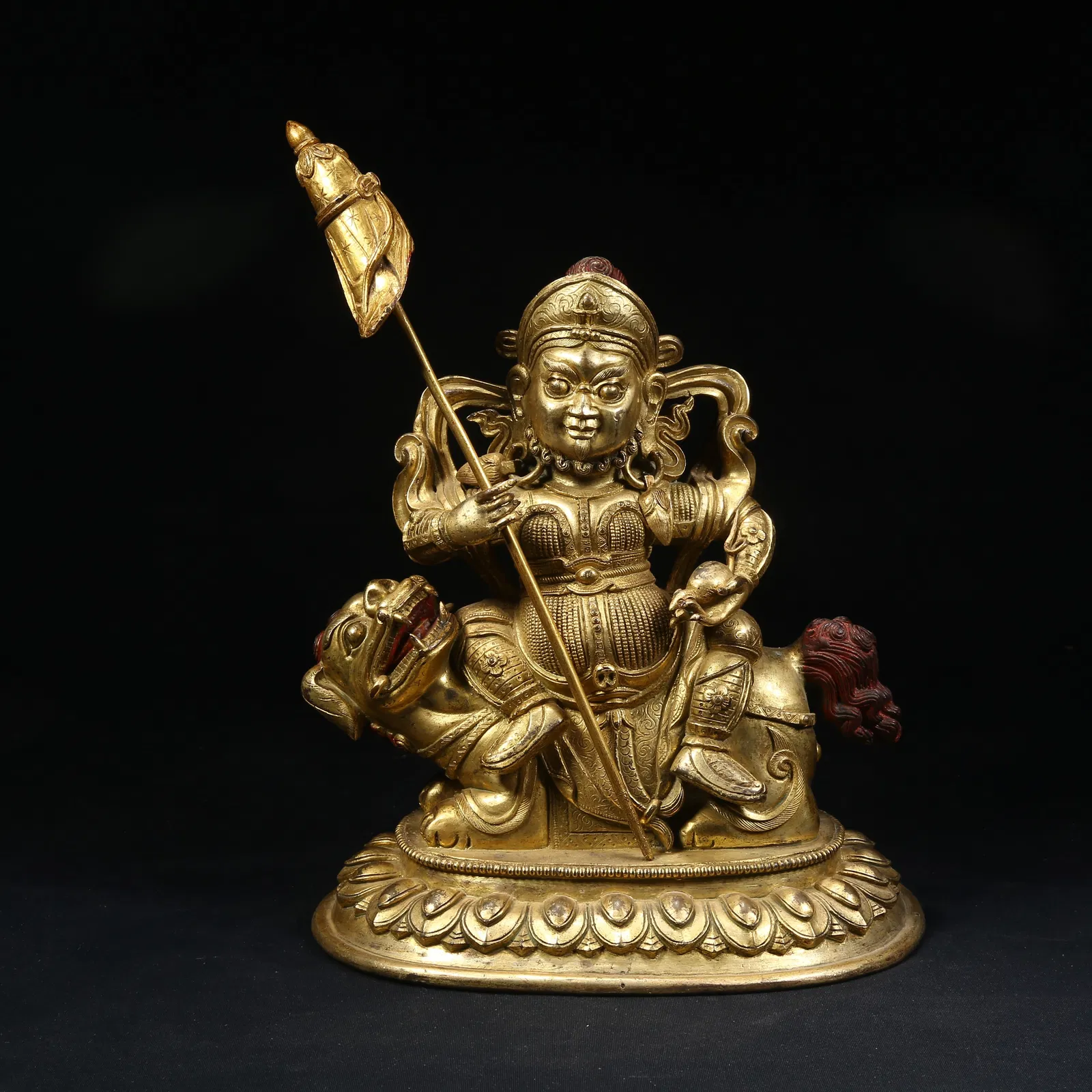 A GILT BRONZE VAISHRAVANA (WEALTH GUARDIAN KING) STATUE