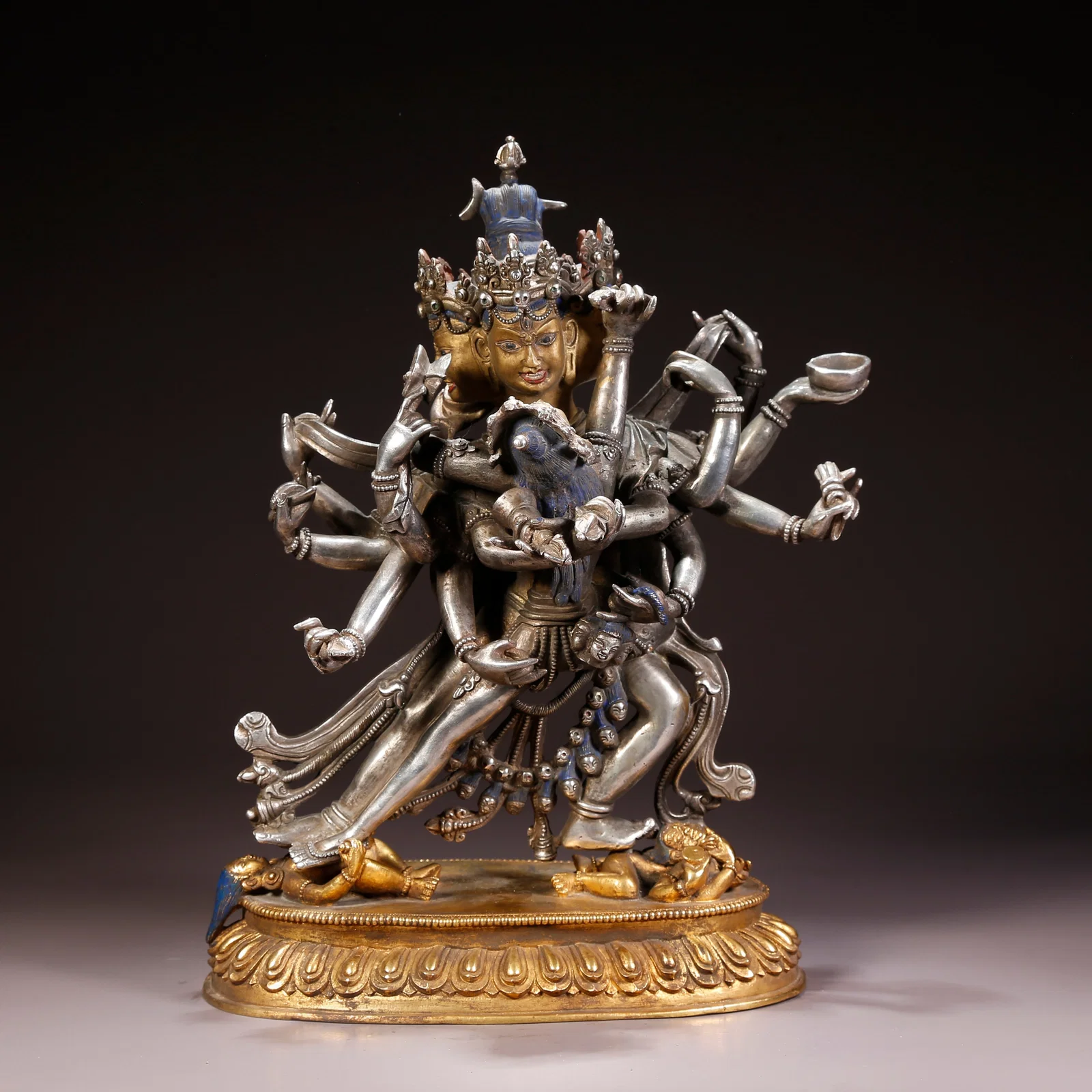 A GILT-BRONZE VAJRA HERUKA FIGURE WITH SILVER INLAY