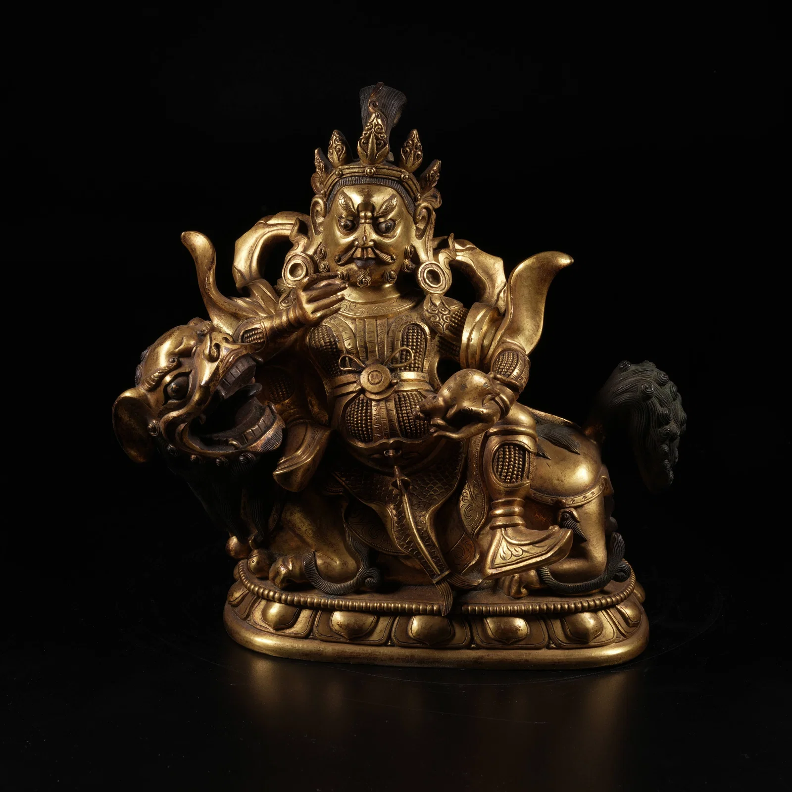 A GILT-BRONZE WEALTH GOD (VASUDHARA) STATUE