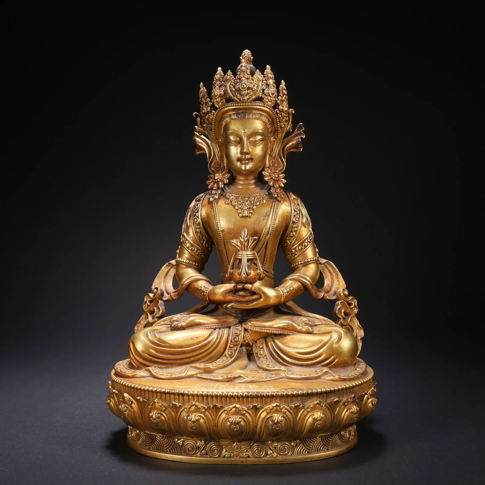 A GILT-COPPER AMITAYUS (INFINITE-LIFE) BUDDHA