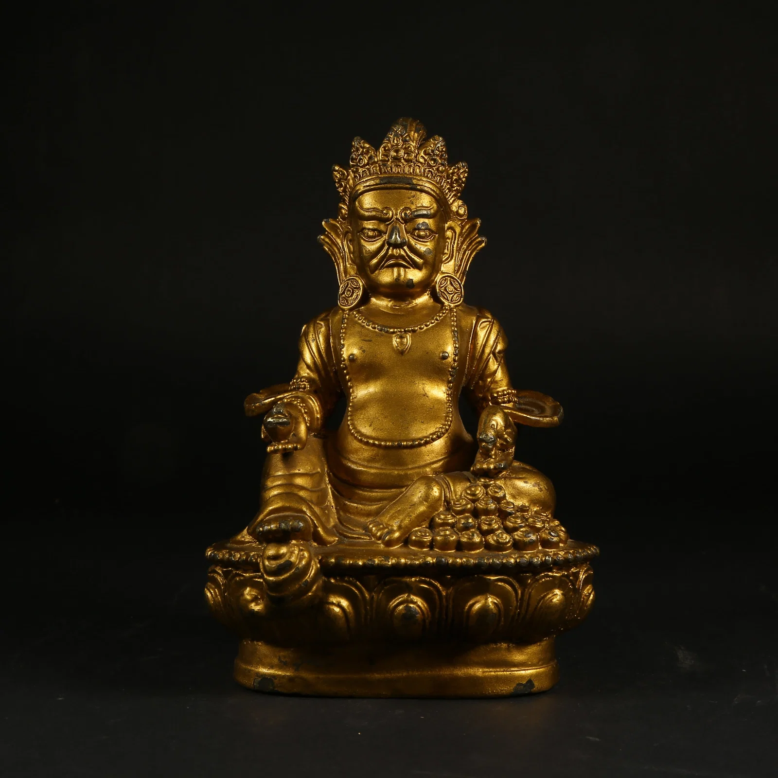 A GILT-LACQUER BRONZE STATUE OF THE YELLOW WEALTH GOD