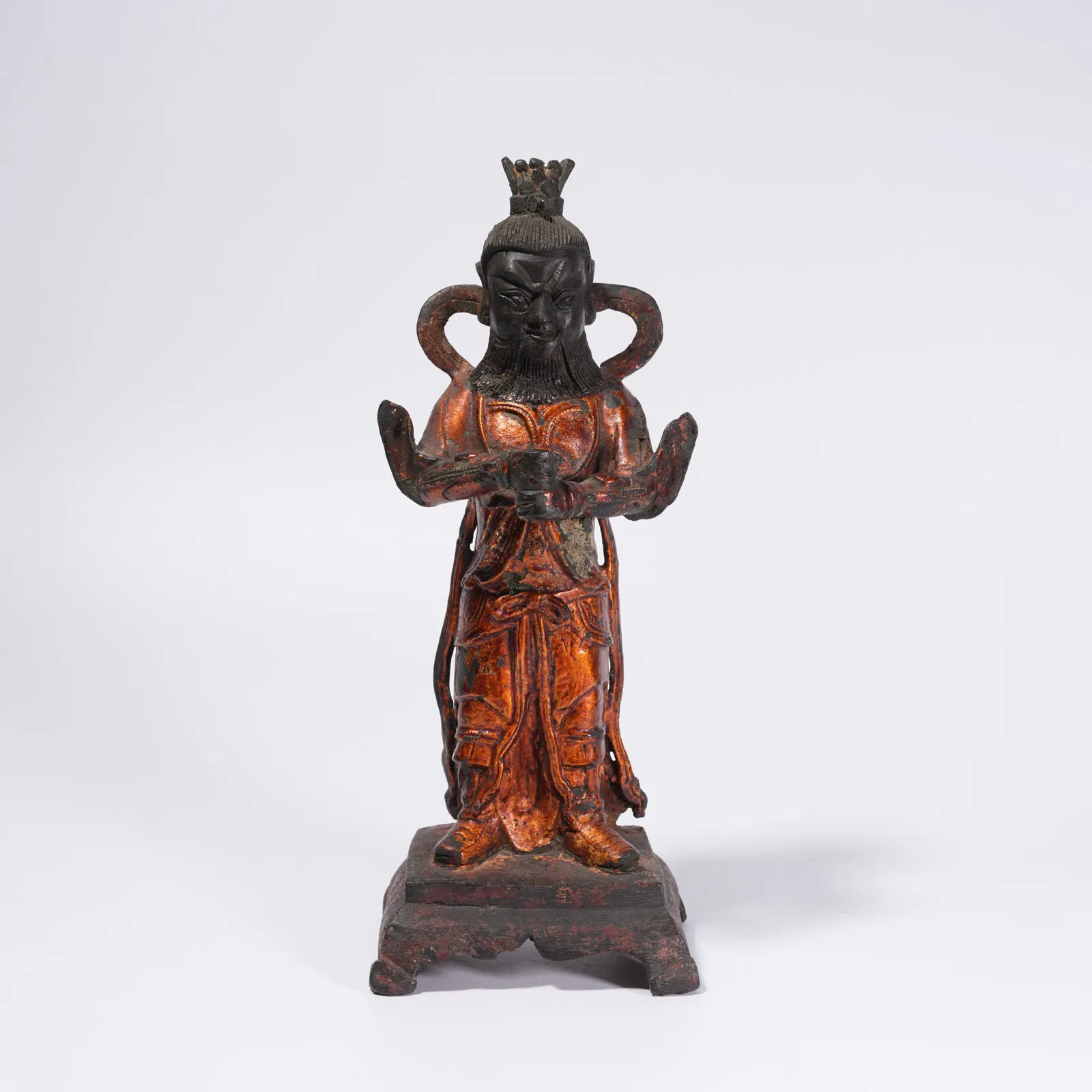 A GILT-LACQUERED BRONZE STATUE