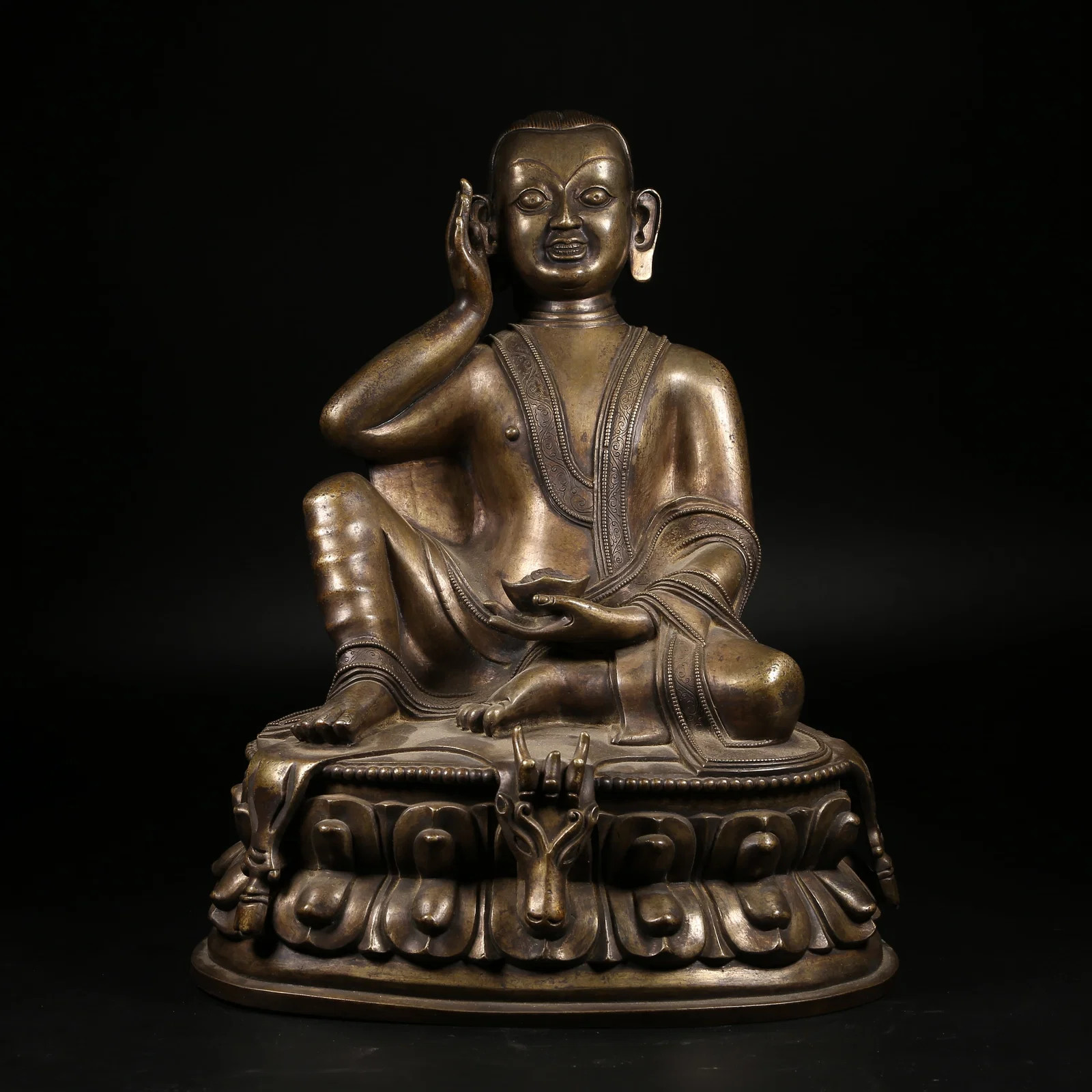 A GILT SILVER MILAREPA STATUE