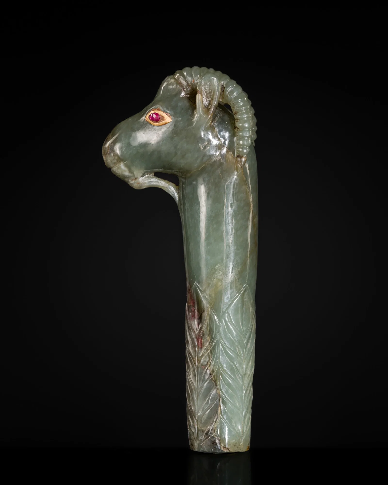 A GOLD-INLAID AND RUBY-SET MUGHAL JADE 'GAZELLE' DAGGER HILT, 18TH-19TH CENTURY