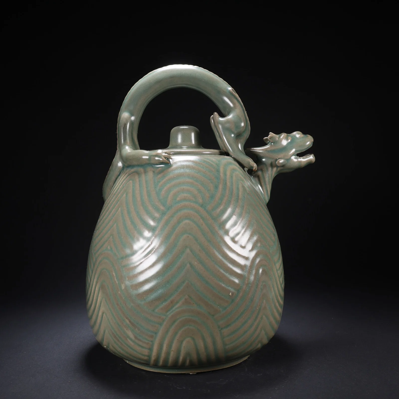 A GORYEO PORCELAIN DRAGON-HEAD WITH RIPPLE PATTERN TEAPOT